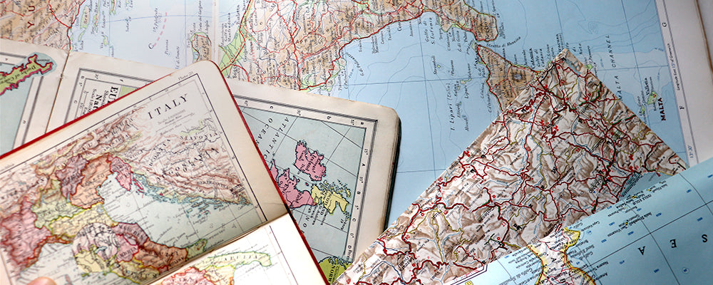 Vintage maps used for creating personalised map jewellery and bespoke cufflinks