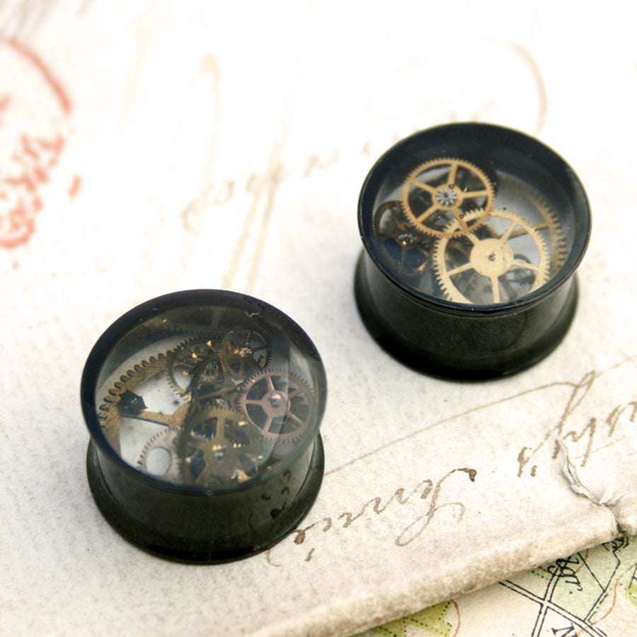 Black steampunk plug earrings with real watch parts in resin