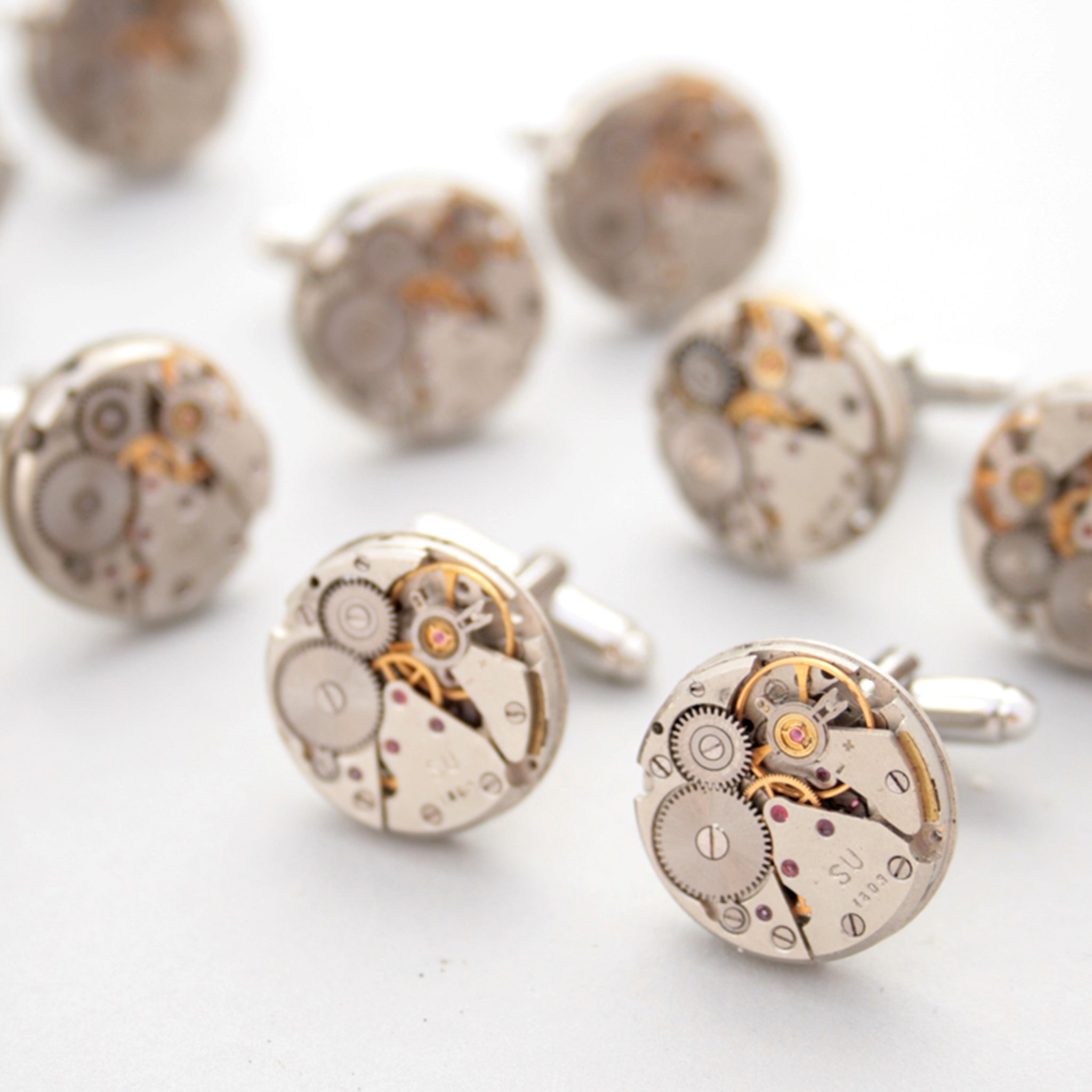 Many sets of Steampunk Cufflinks for Men made of real watches