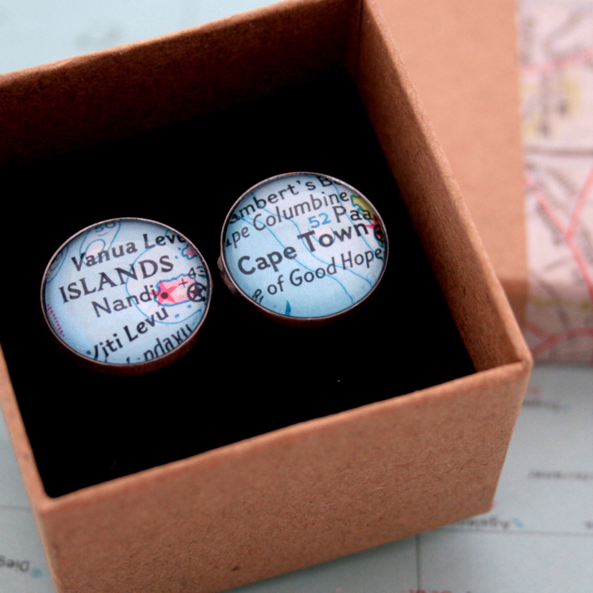 Personalised map cufflinks in gunmetal color featuring custom maps in a box