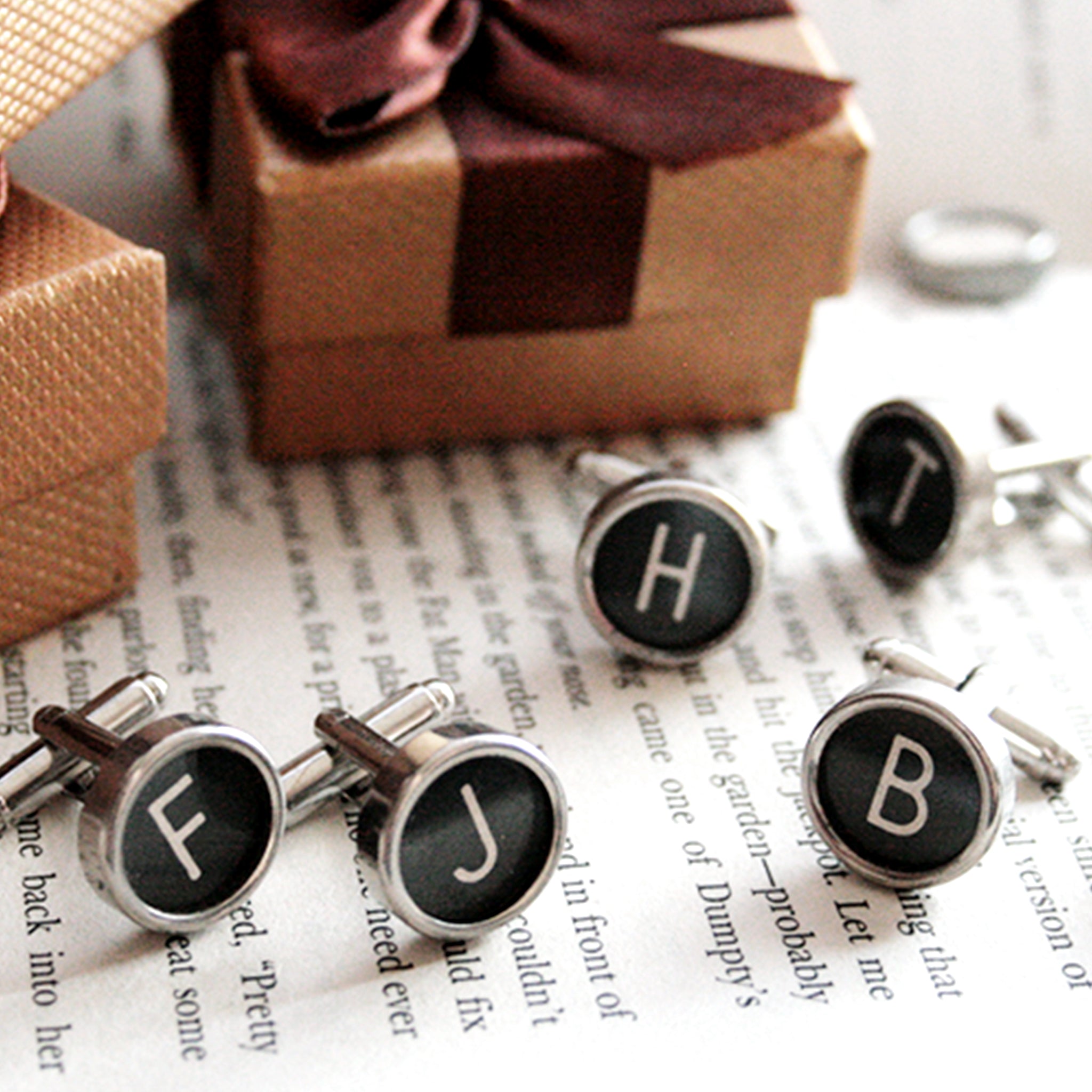 Many sets of cufflinks with initials made of real typewriter keys