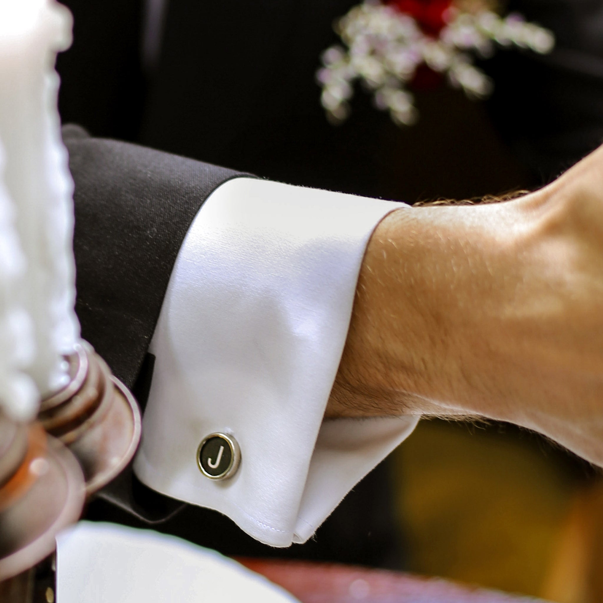 Man wearing Black Personalised cufflinks with initials made of real typewriter keys
