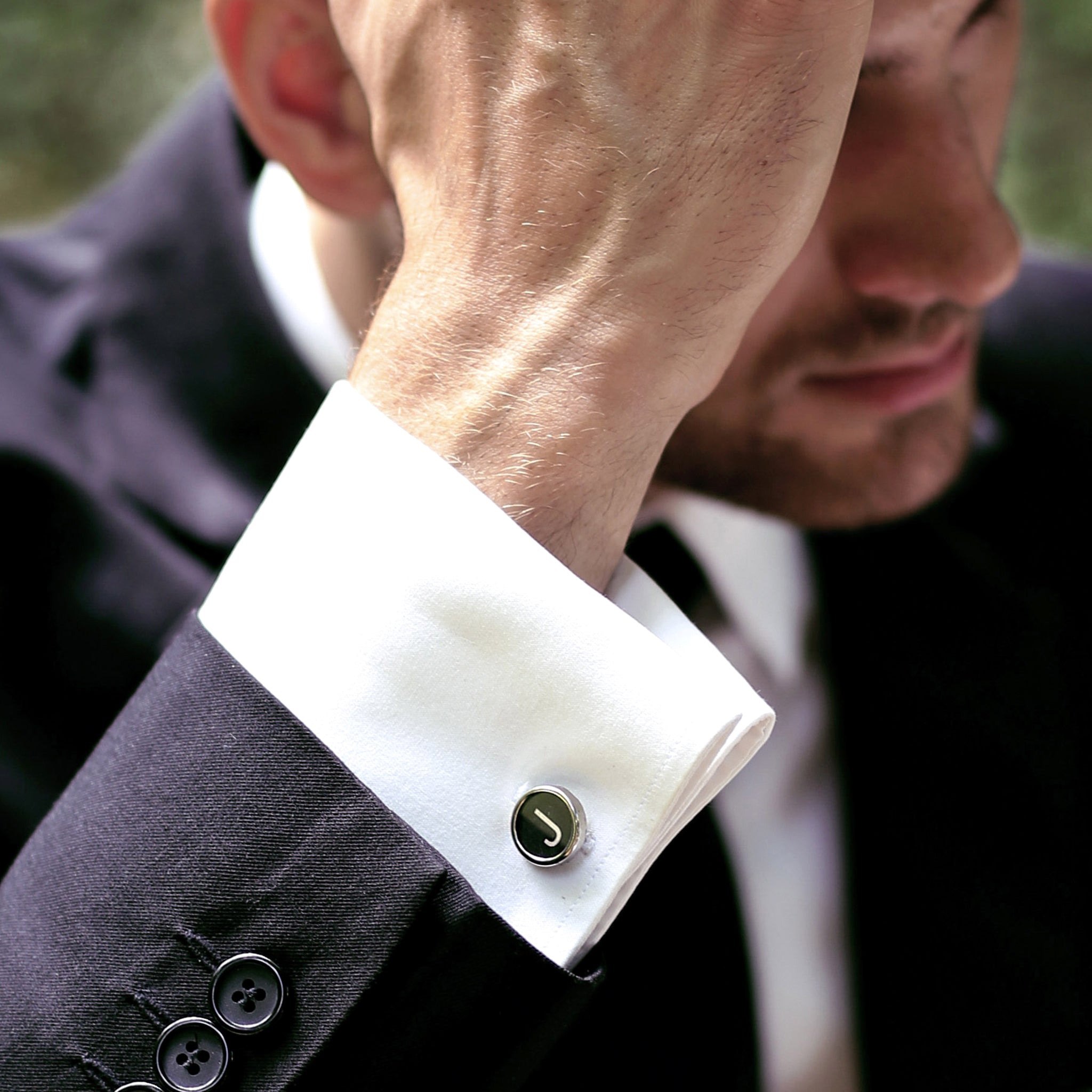 Man wearing Black Personalised cufflinks with initials made of real typewriter keys