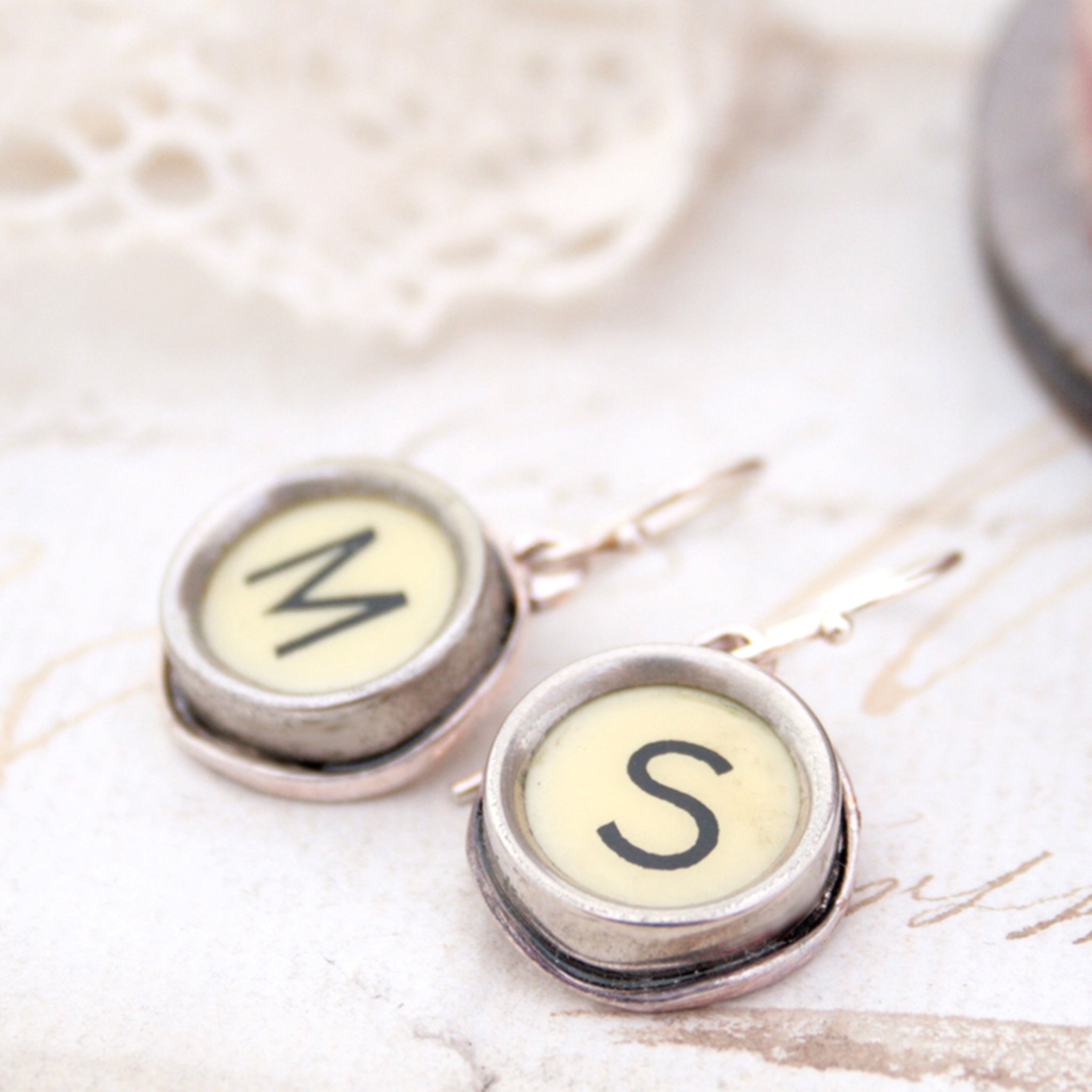 personalised initial earrings made of real typewriter keys M and S