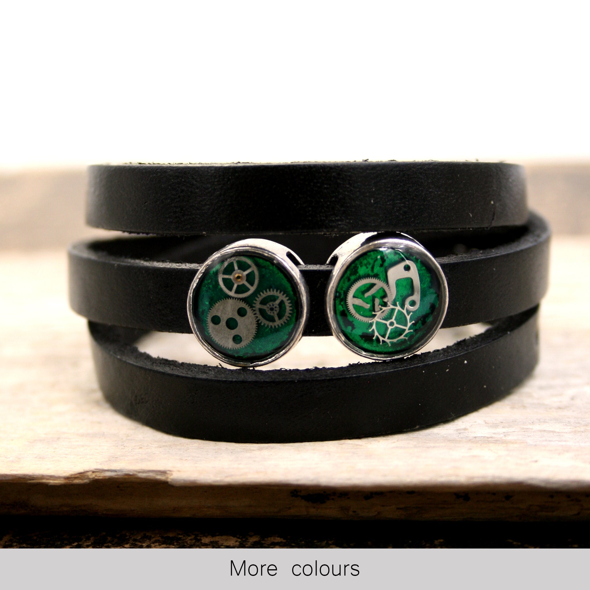 Black leather triple wrap bracelet with green steampunk slider beads with watch parts