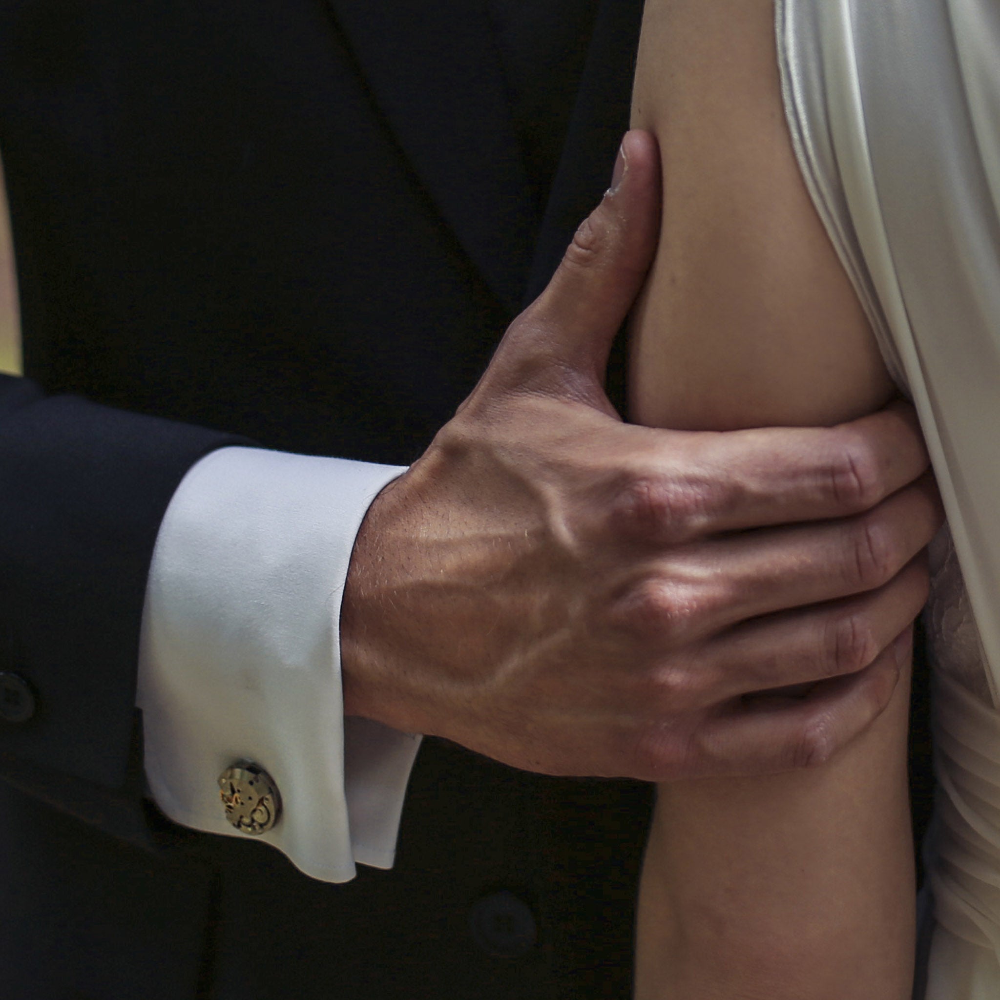Groom wearing Steampunk Cufflinks for Men made of real watches