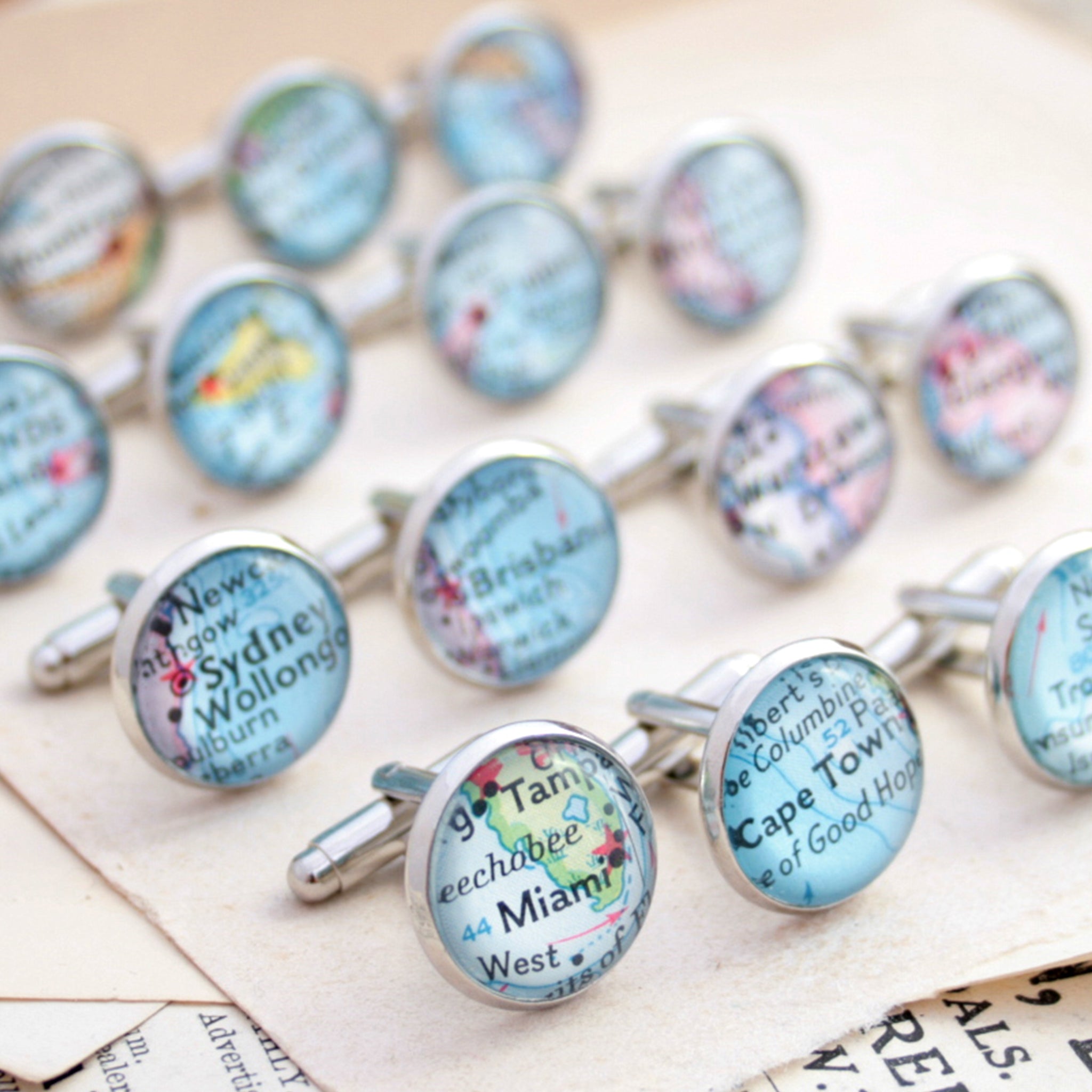 Personalised map cufflinks in silver tone featuring custom maps
