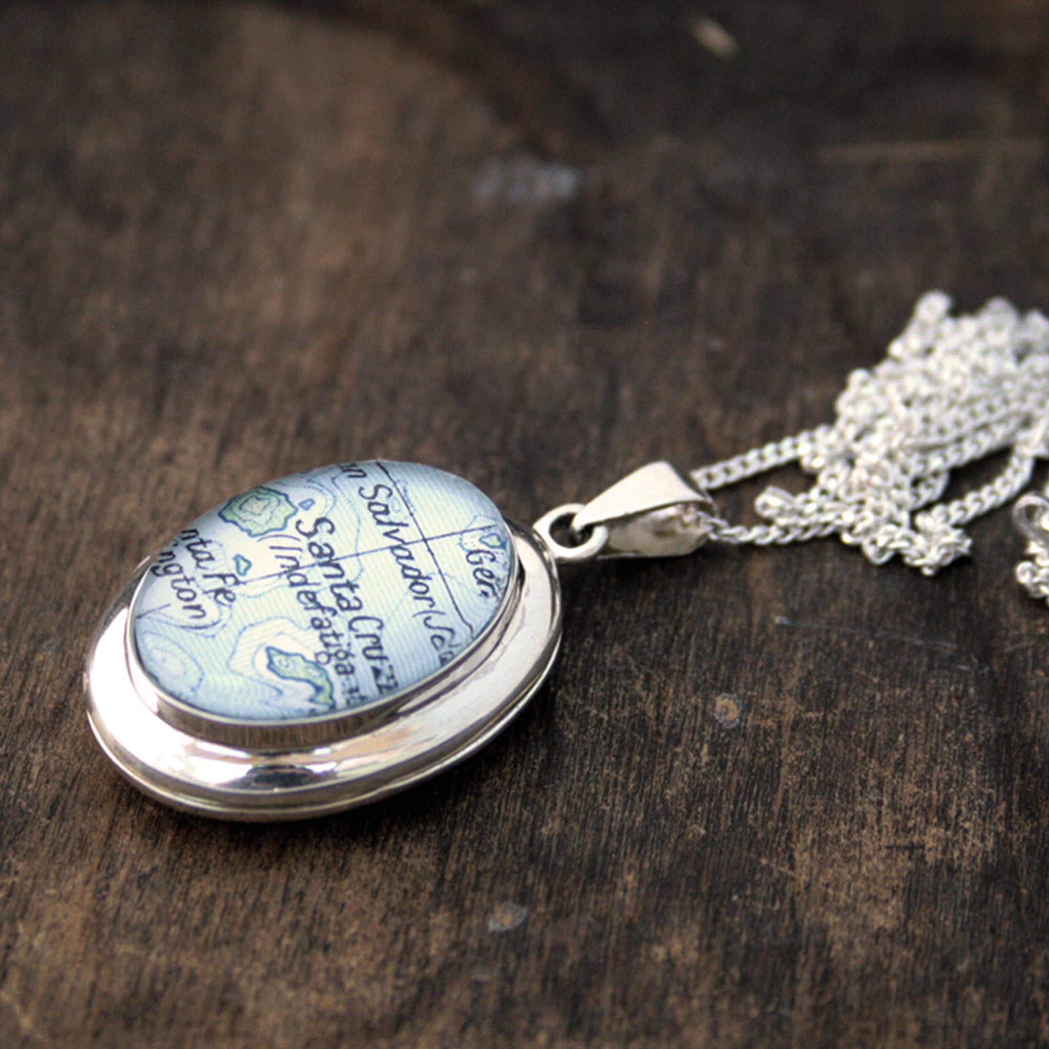 Sterling Silver locket necklace featuring map of Santa Cruz