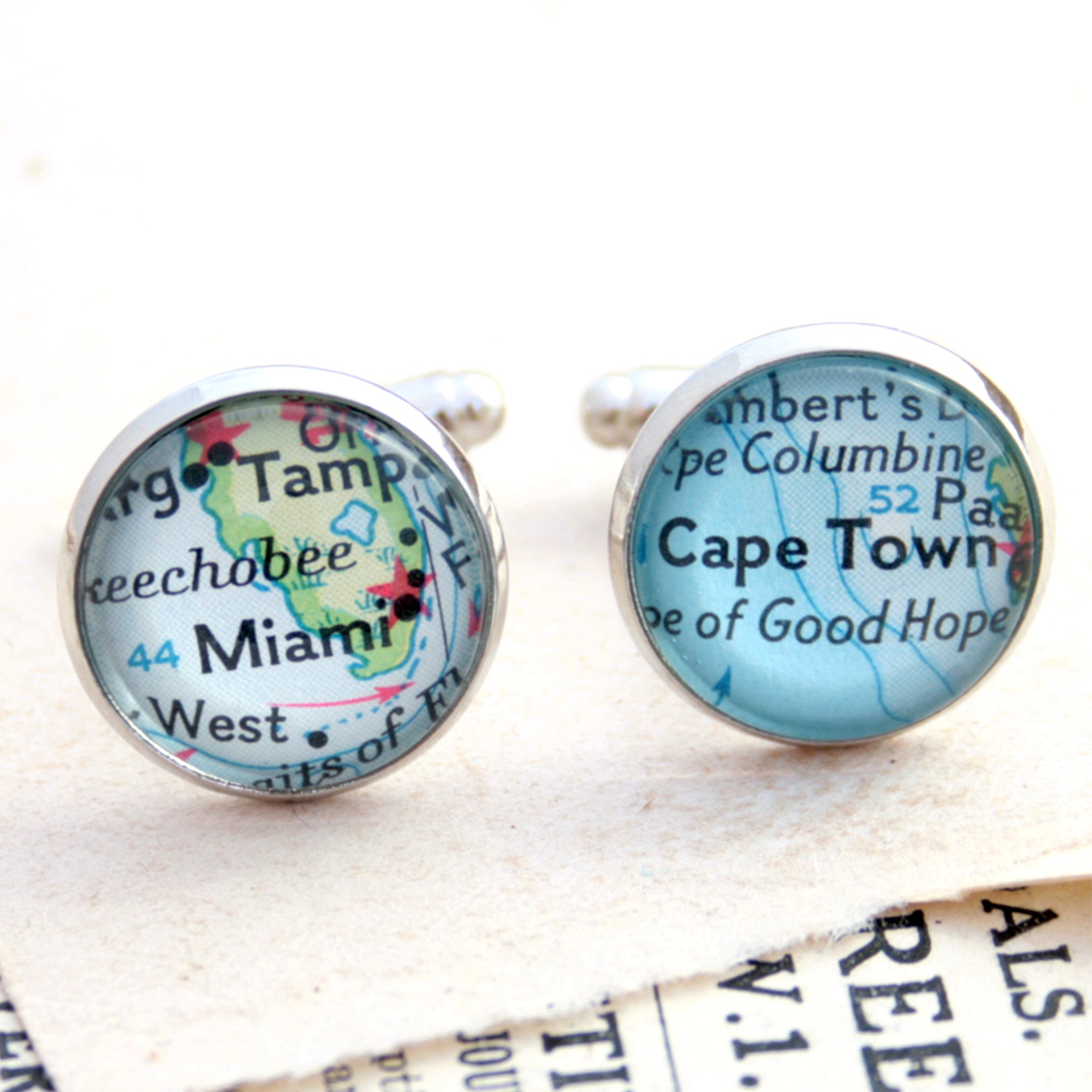 Personalised map cufflinks in silver tone featuring maps of Cape Town and Miami