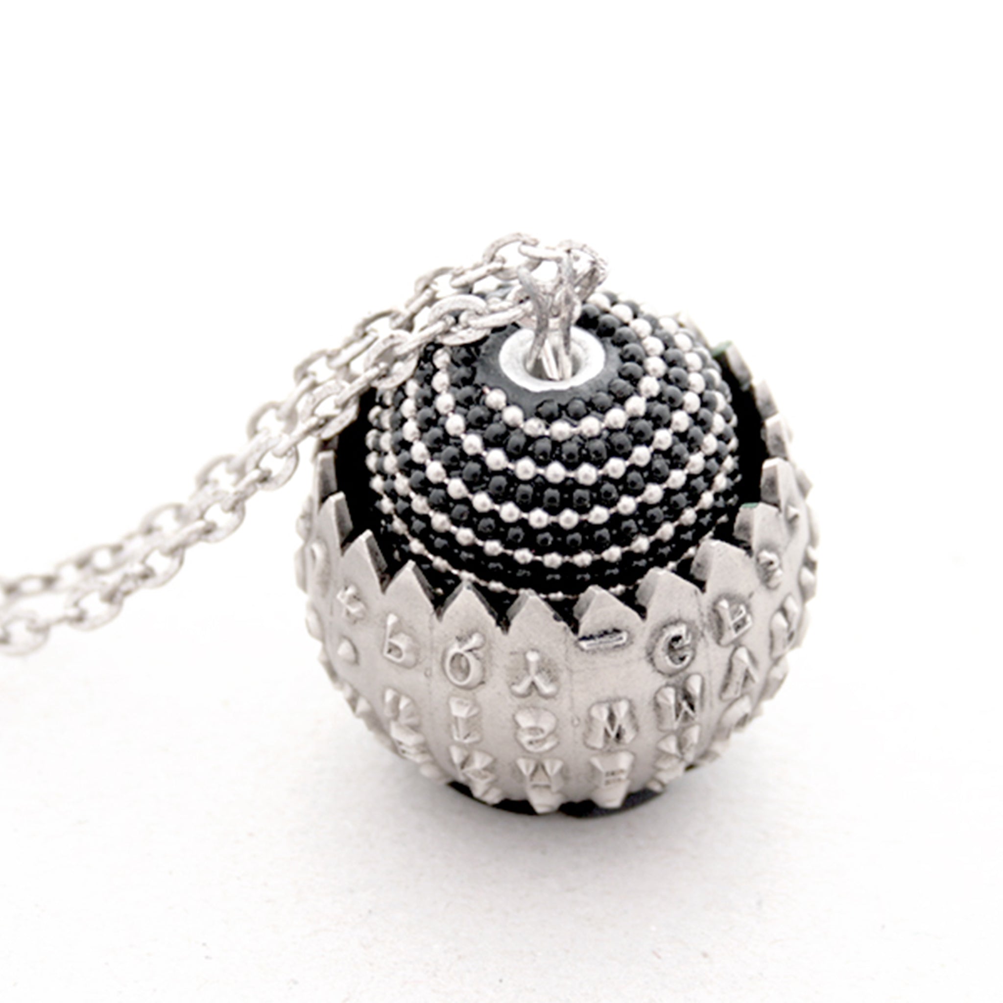 IBM Selectric typewriter font ball with large metal bead turned into eye catching necklace