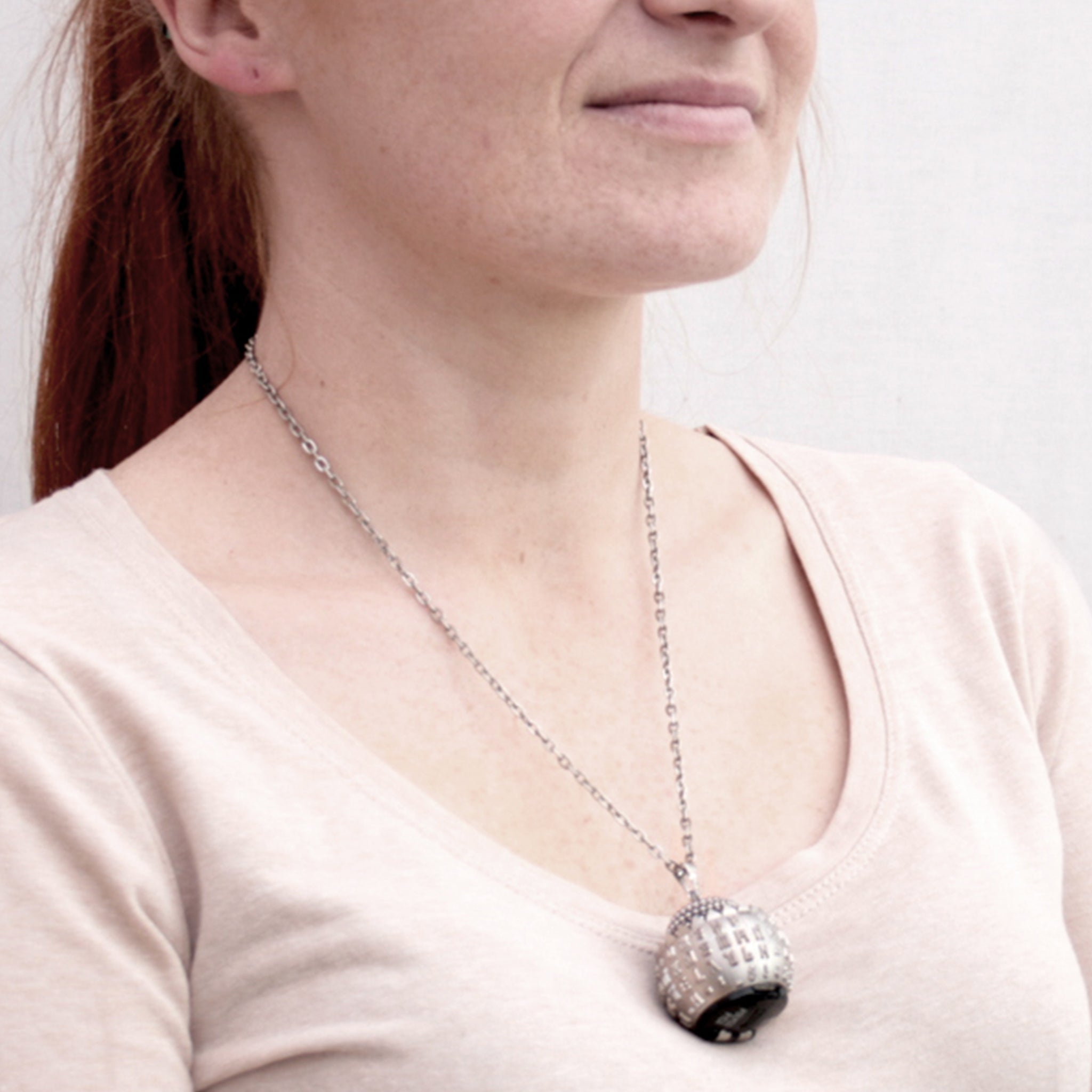 IBM Selectric typewriter font ball with large metal bead turned into eye catching necklace