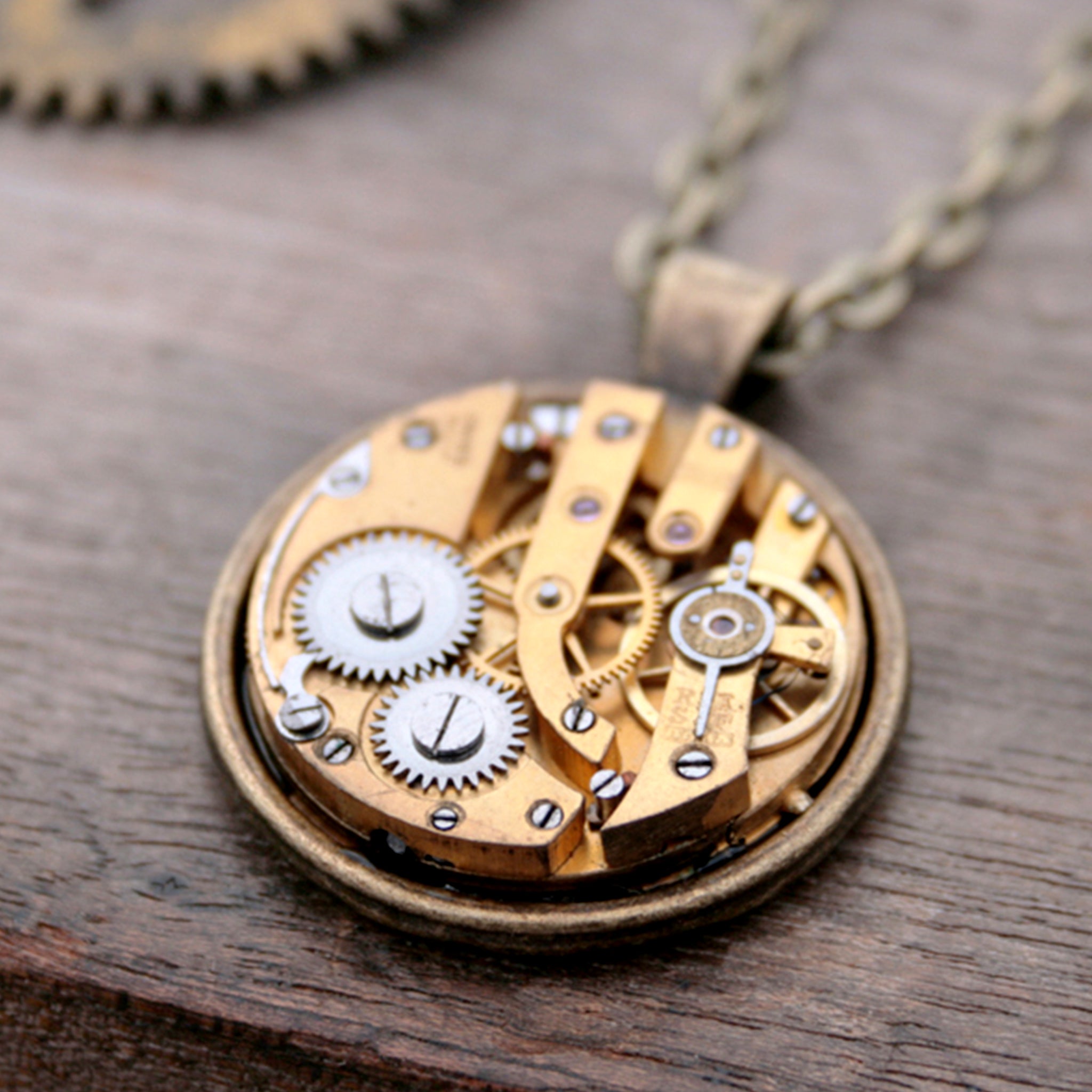 Steampunk Necklace in Gold Tone with gold watch movement