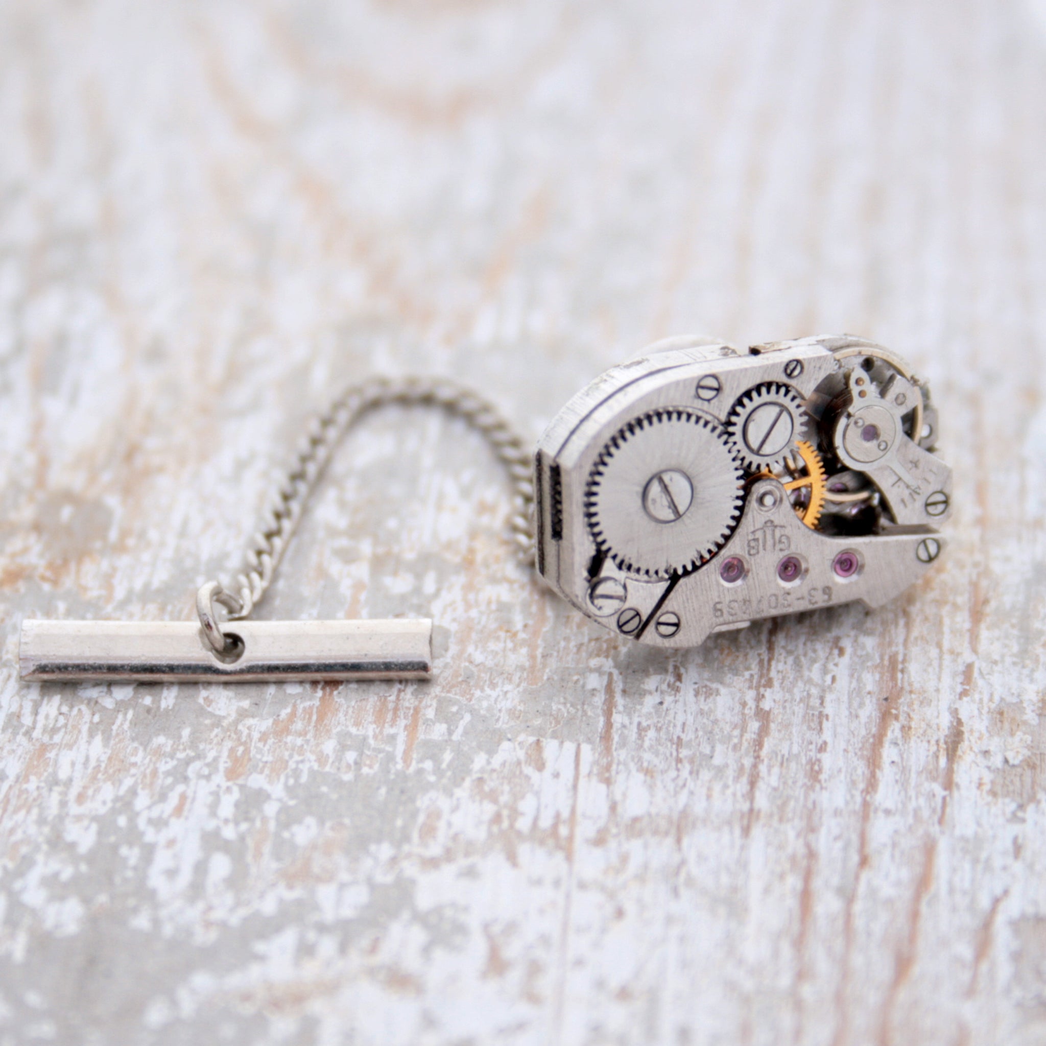 Tie Tack with antique watch movement