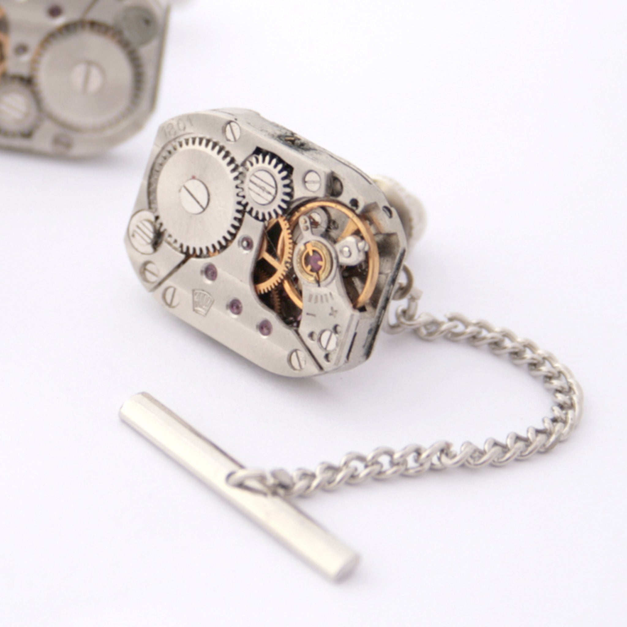 Tie tack made of watch movement