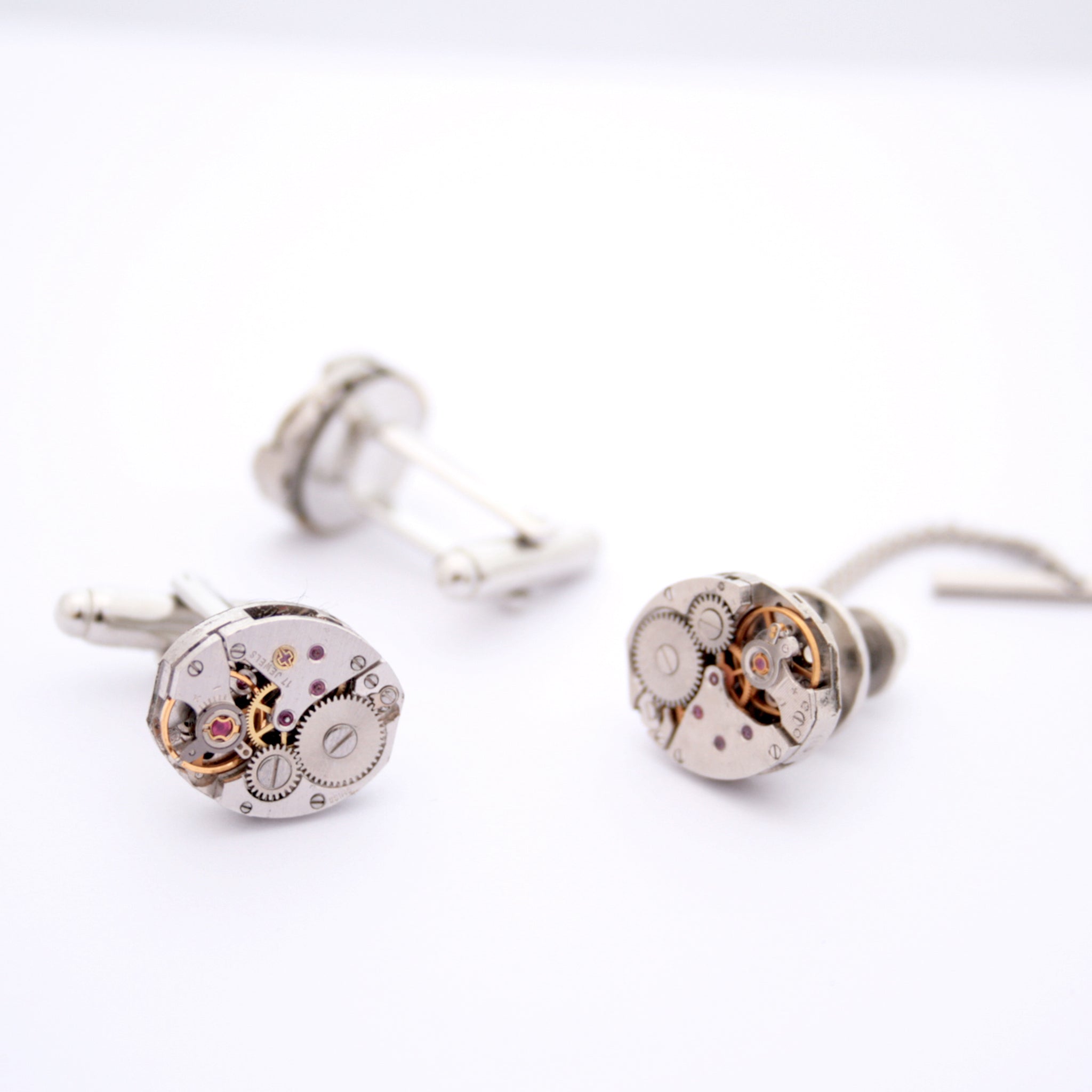 Tie Tack and Cufflinks featuring old clock parts
