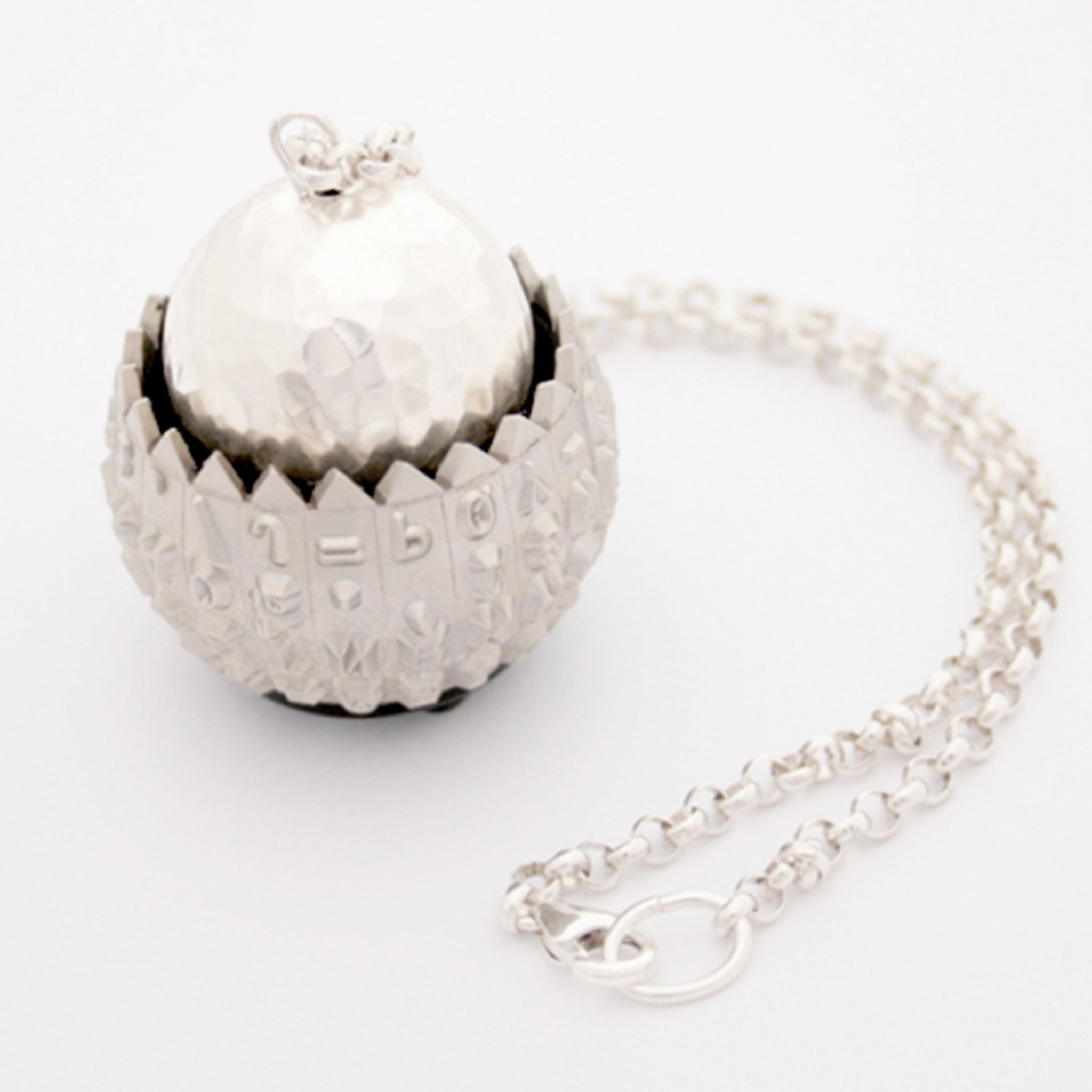 IBM Selectric typeball with sterling silver bead turned into quirky necklace