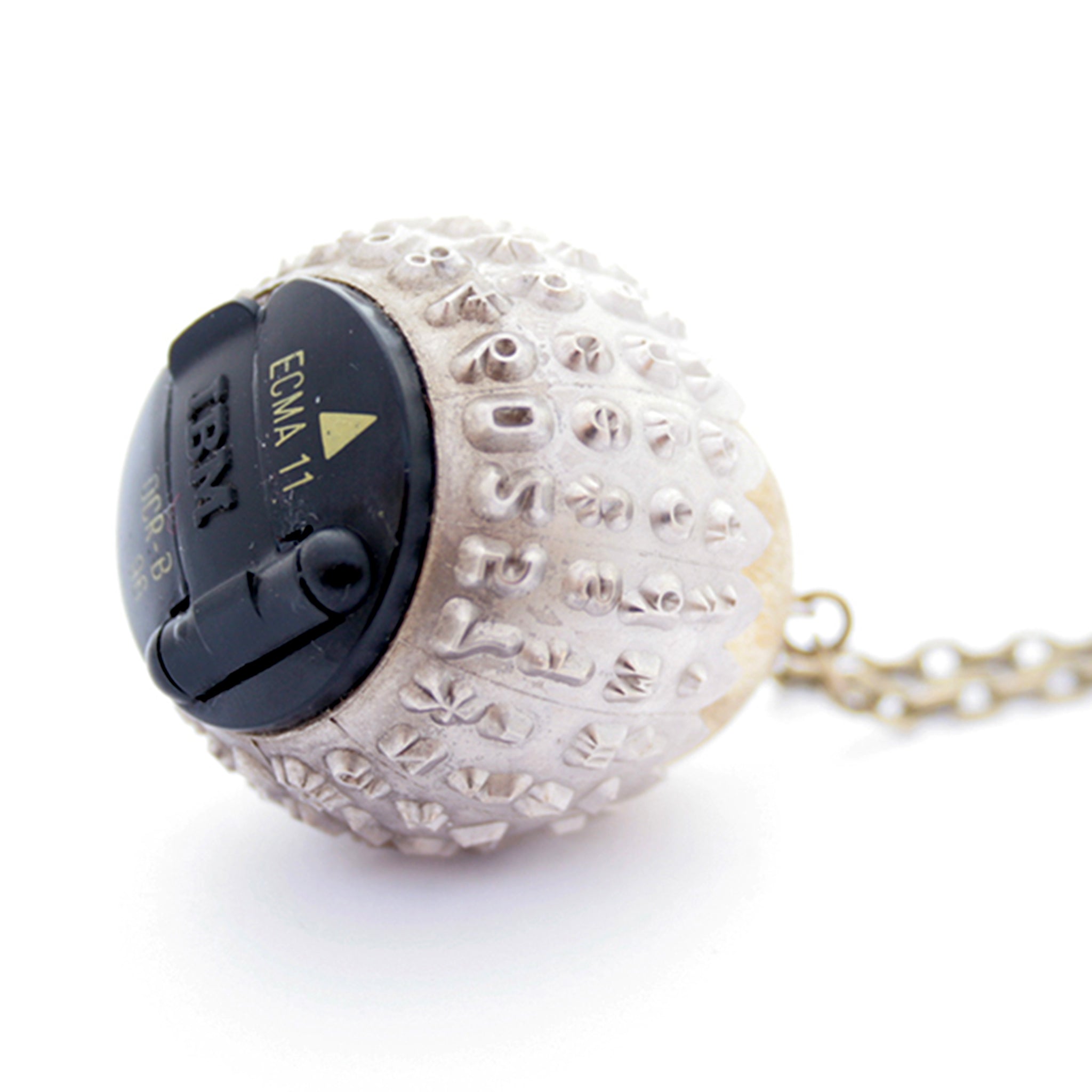 IBM Selectric typewriter font ball with large gold tone bead turned into eye catching necklace