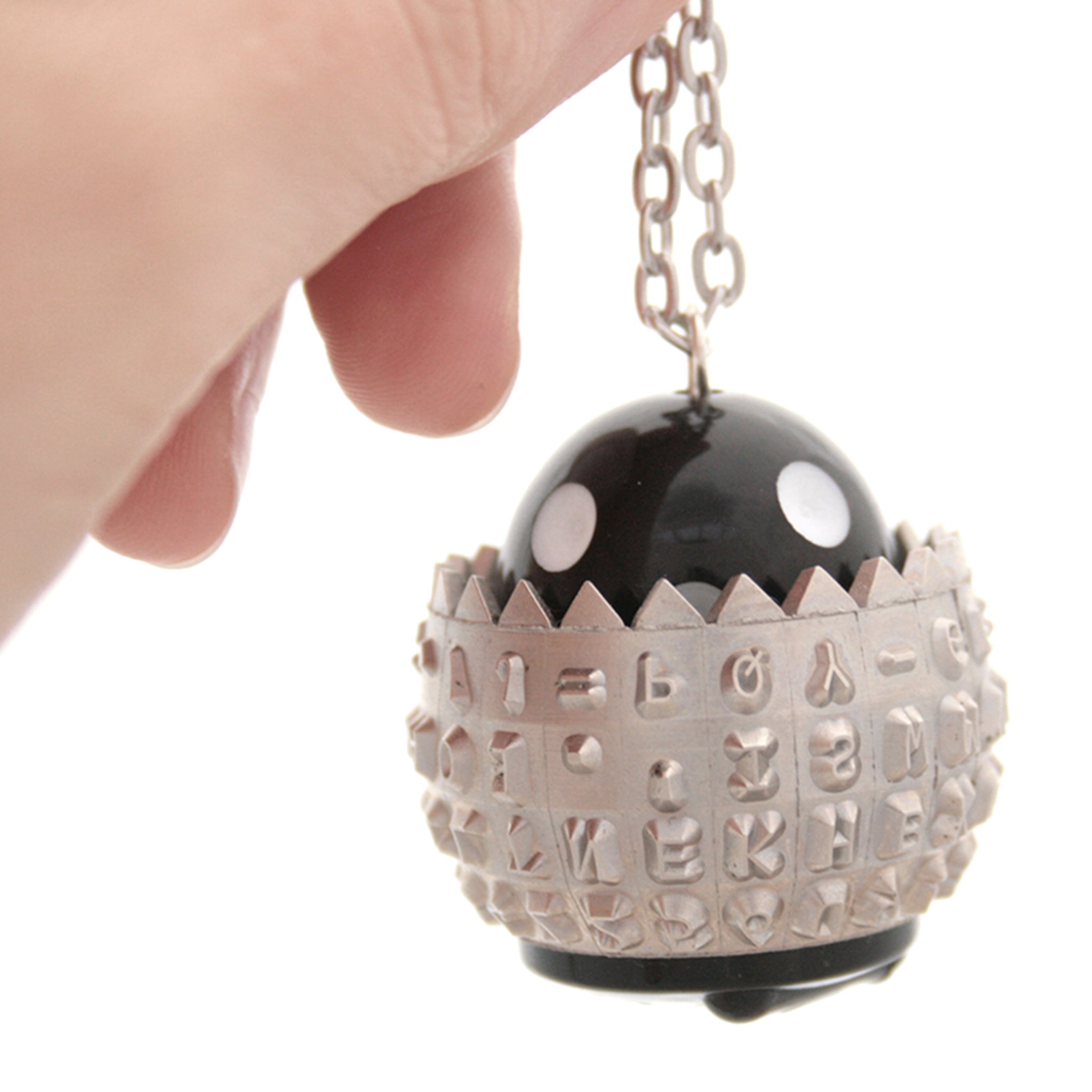 IBM Selectric typewriter font ball with large black and white bead turned into a necklace
