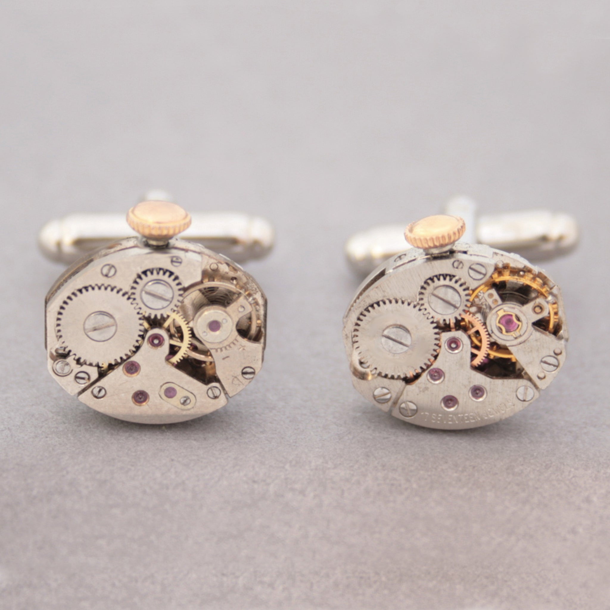 steampunk wedding cufflinks featuring antique watch movements with wind ups