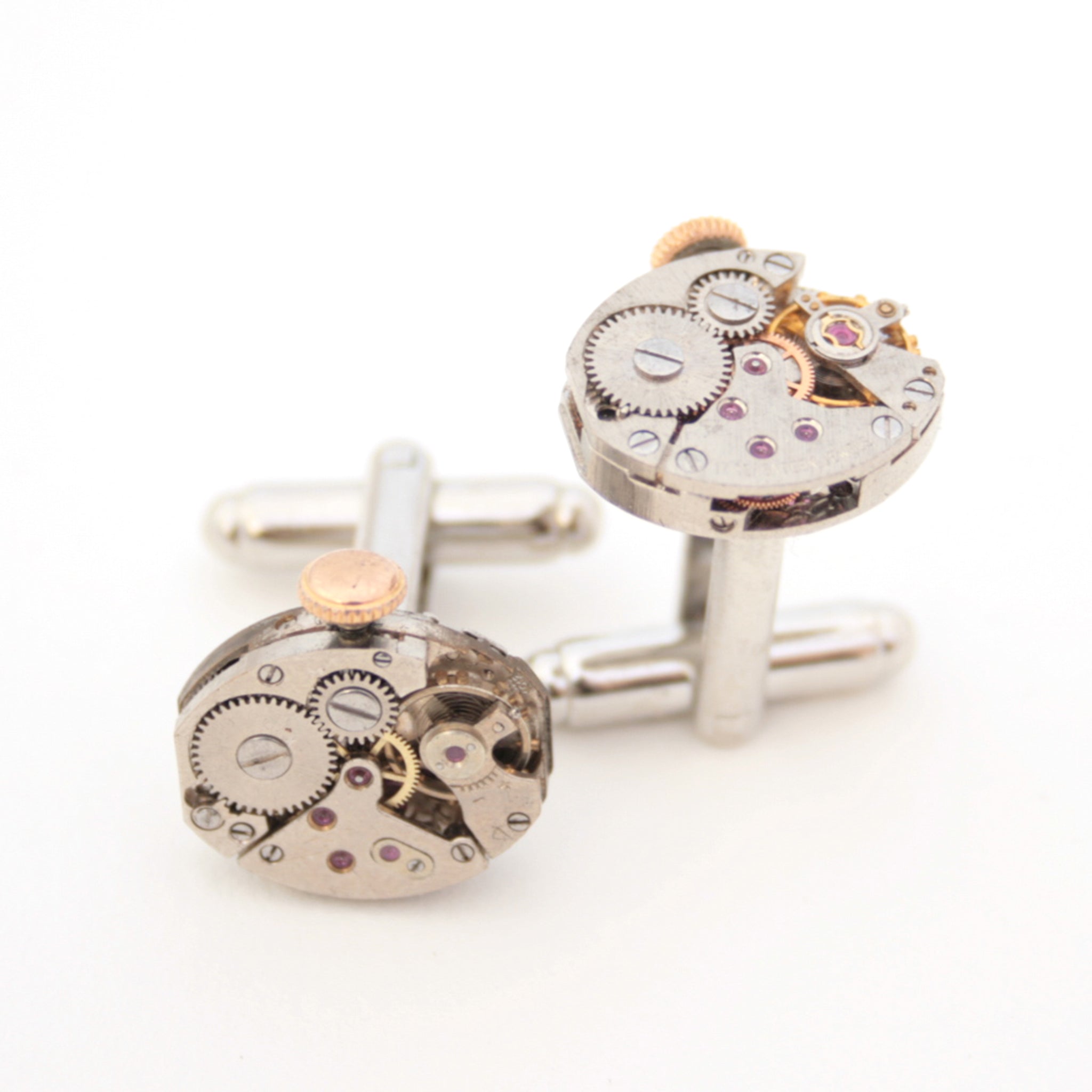 steampunk wedding cufflinks featuring antique watch movements with wind ups