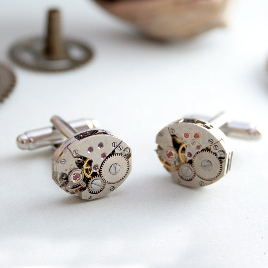 steampunk womens cufflinks featuring antique watch movements