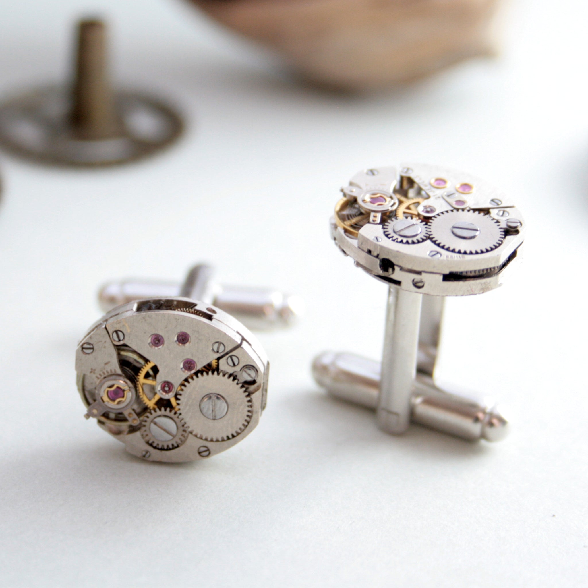 steampunk womens cufflinks featuring antique watch movements