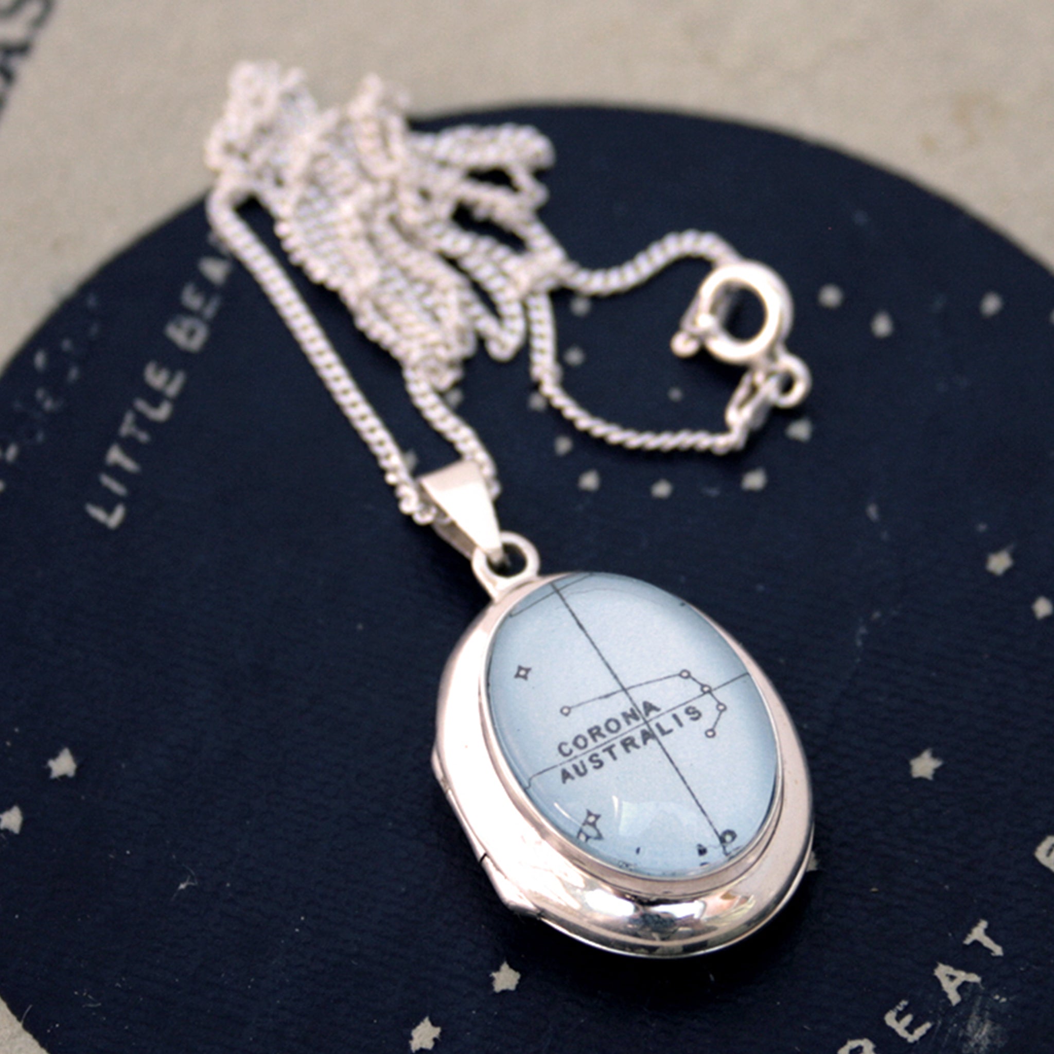 Sterling Silver locket necklace featuring Corona Australis star constellation