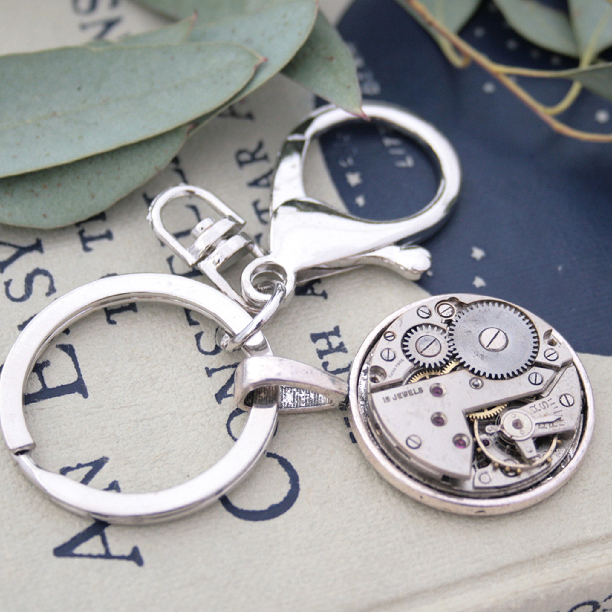 Very manly, steampunk keychain, made of real antique watch movement on metal base in silver tone