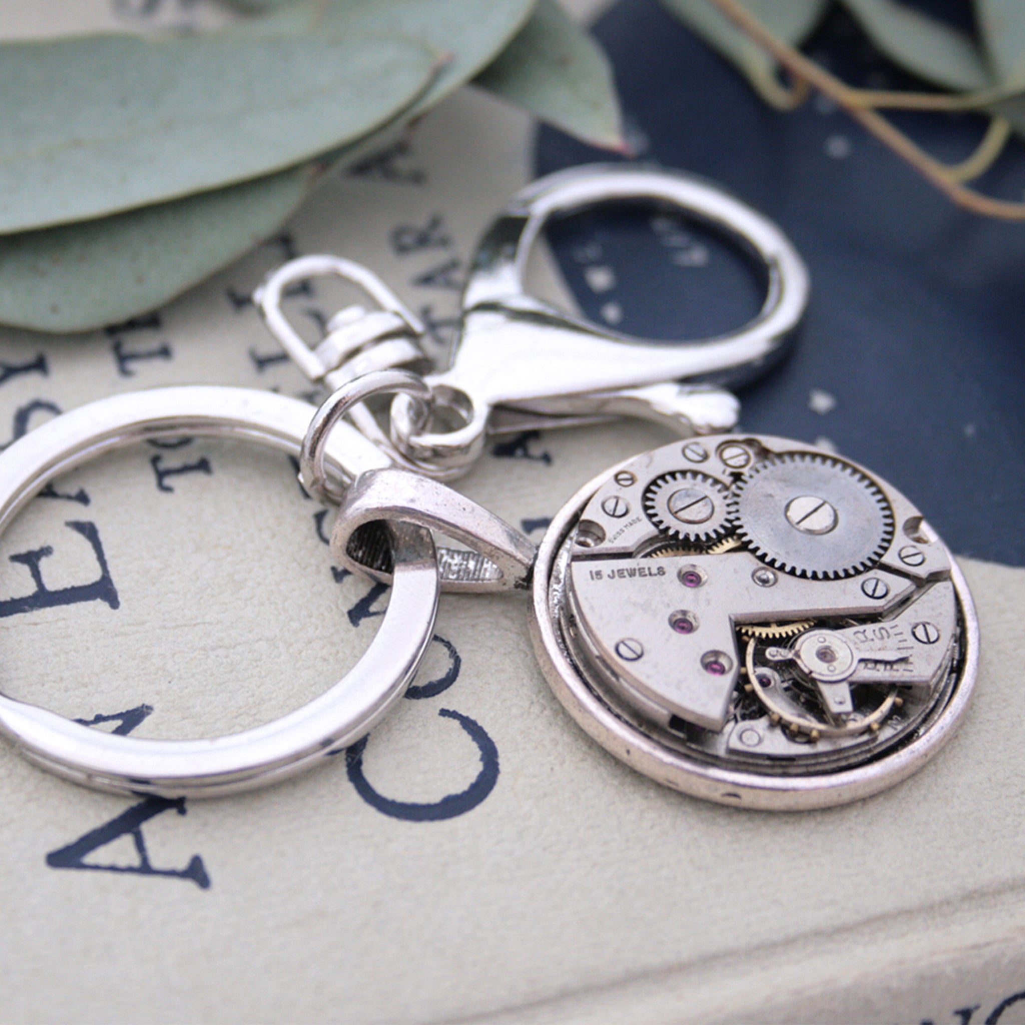 Very manly, steampunk keychain, made of real antique watch movement on metal base in silver tone