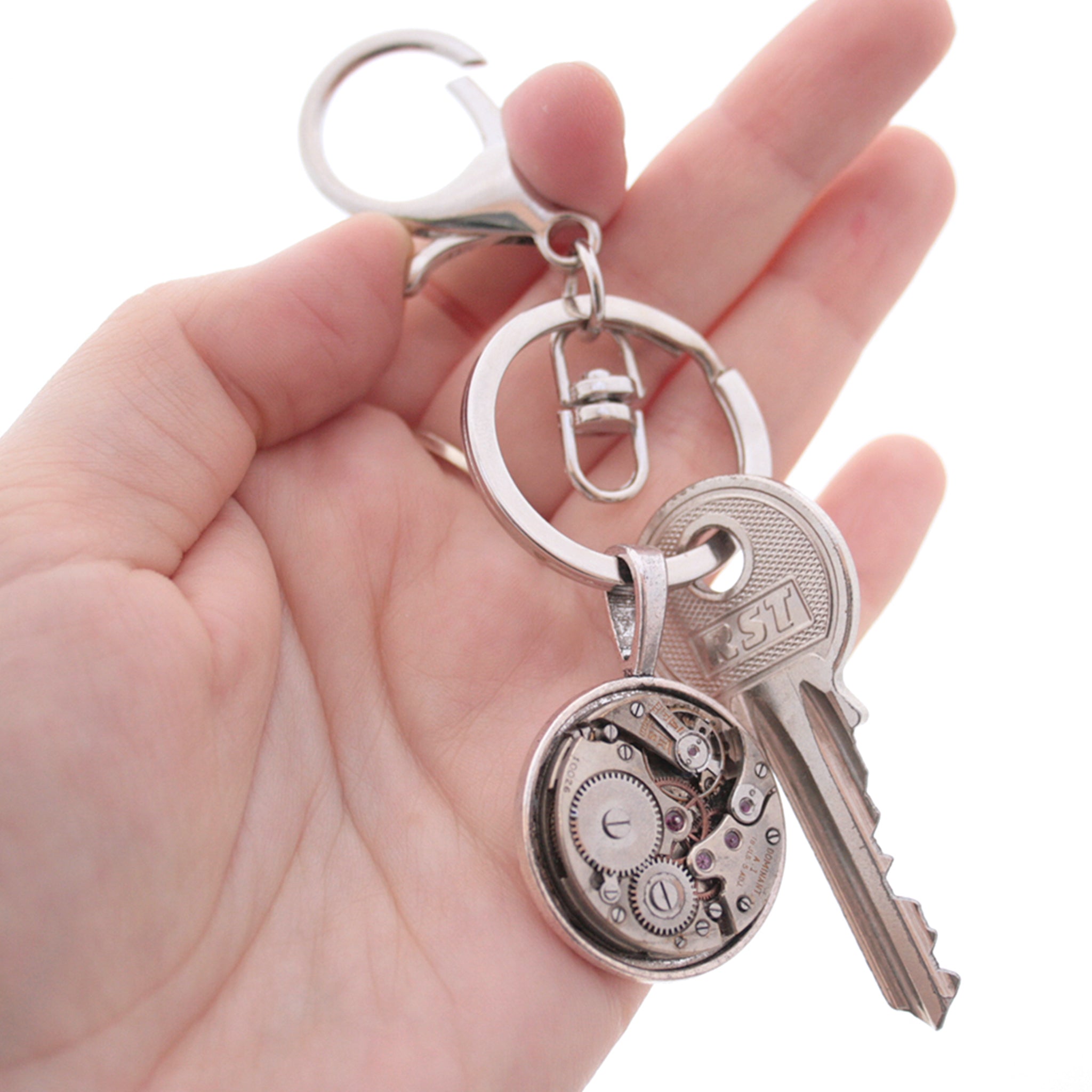 Very manly, steampunk keychain, made of real antique watch movement on metal base in silver tone