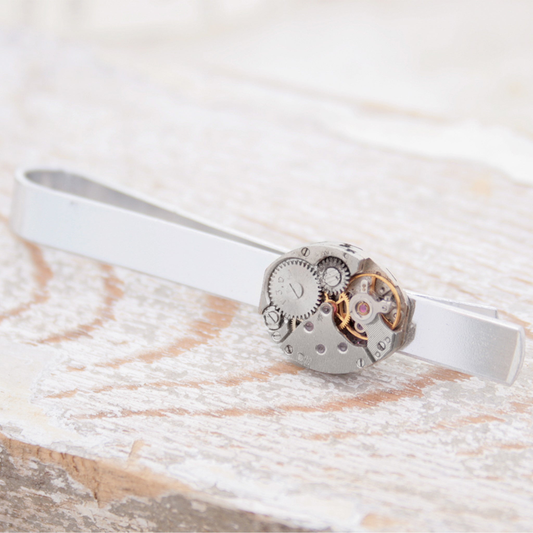 Tie Clip featuring old clock parts