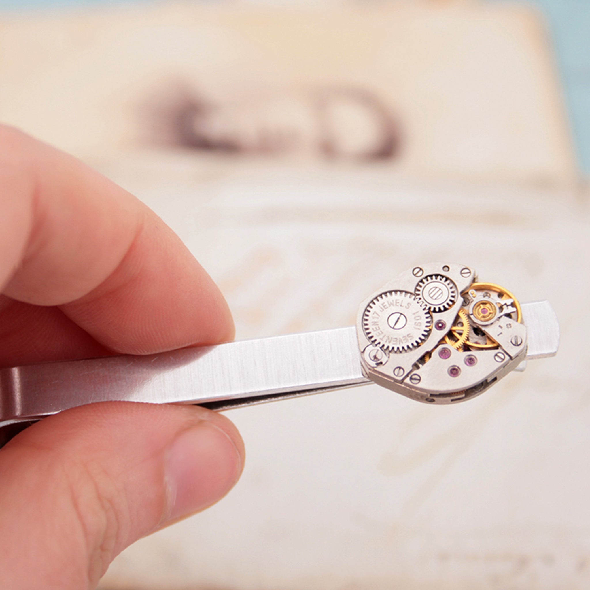Steam punk tie clip made of real watch hold in hand