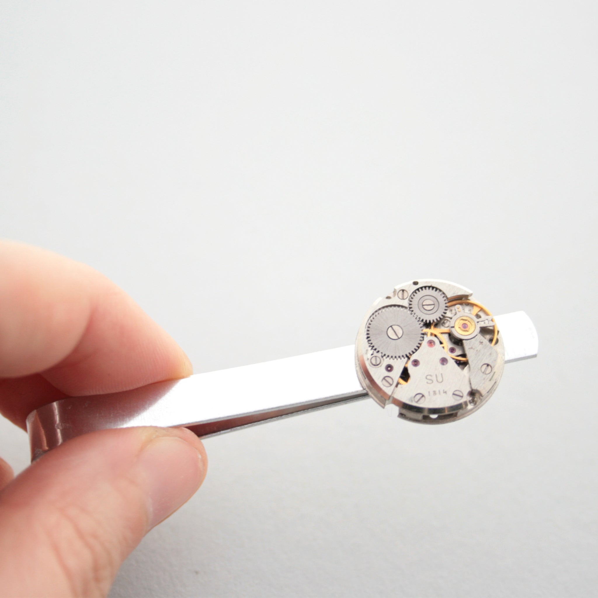 Steampunk Watch Movement Tie Clip hold in hand