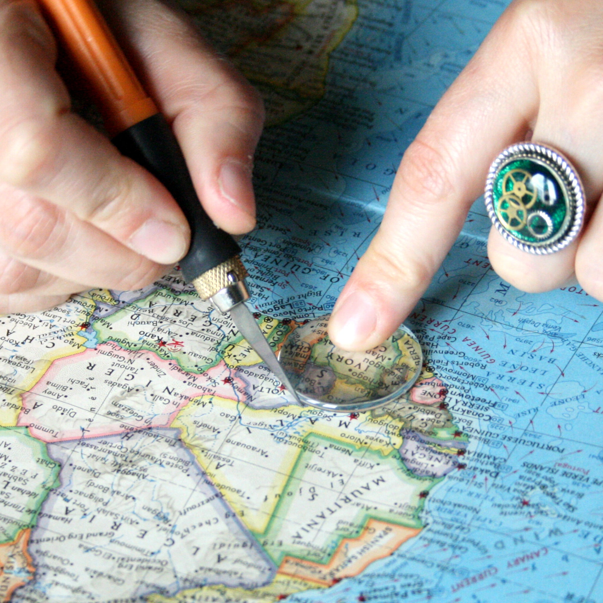 Making custom map jewellery using vintage maps and atlases