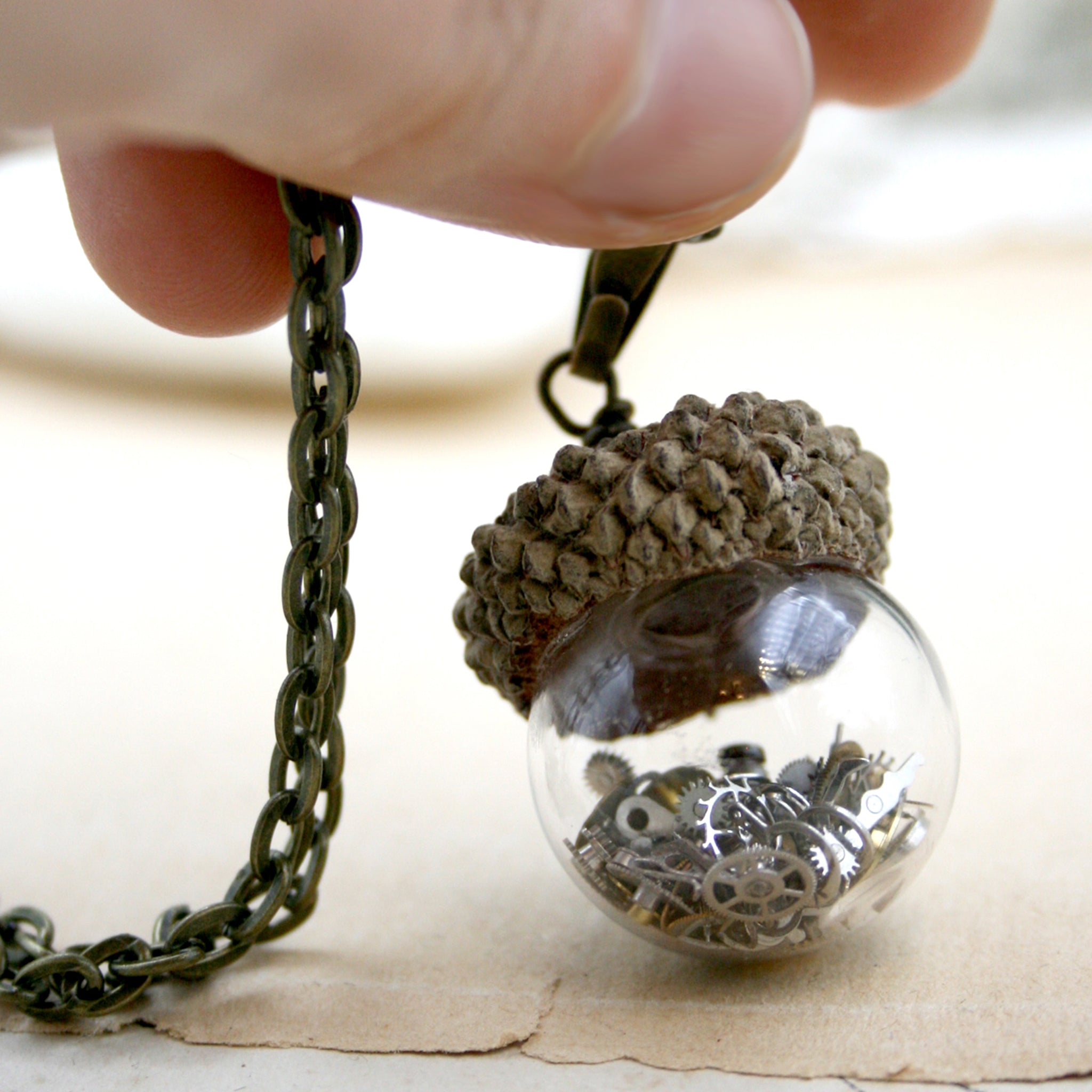 steampunk terrarium pendant necklace made of glass with real acorn top