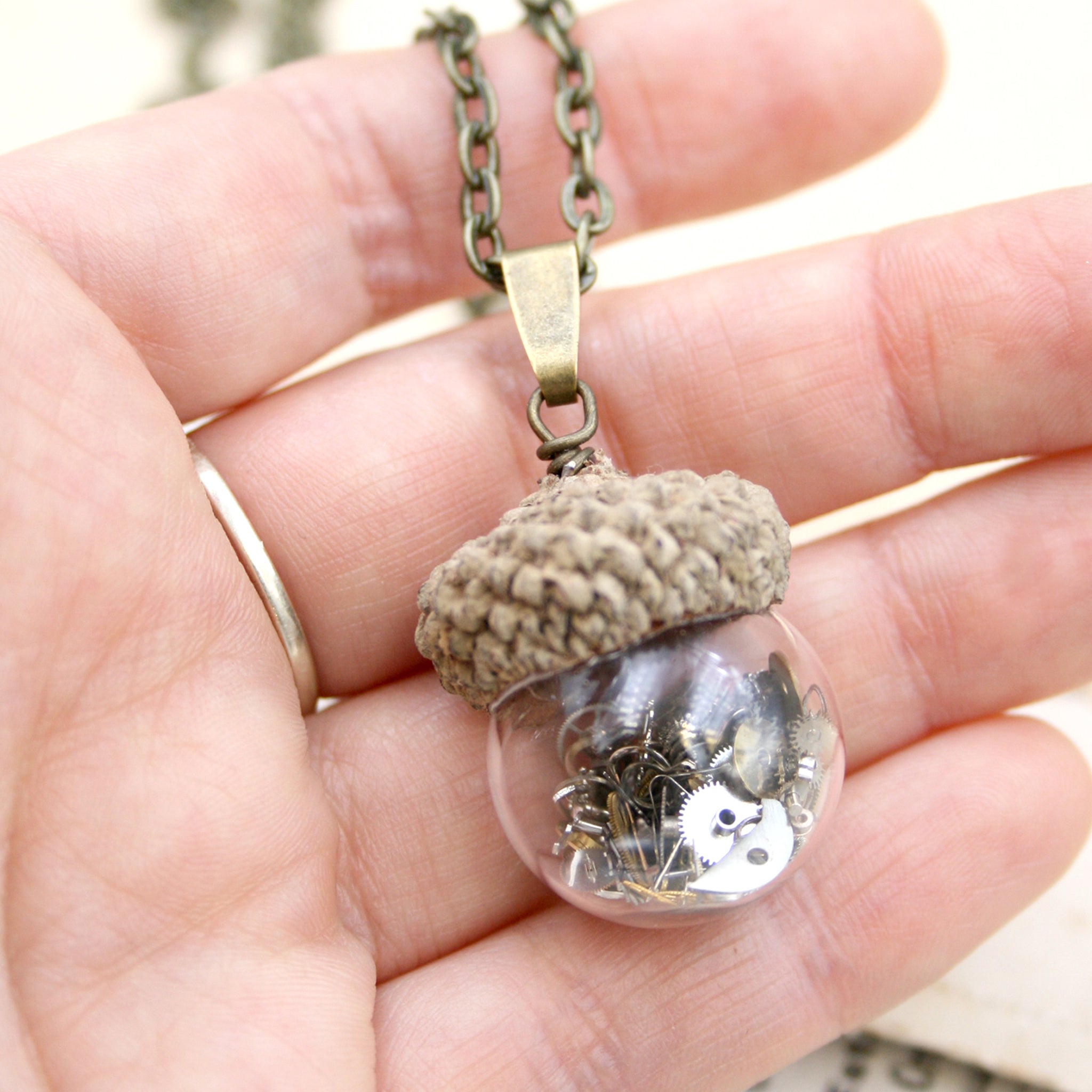 steampunk terrarium pendant necklace made of glass with real acorn top