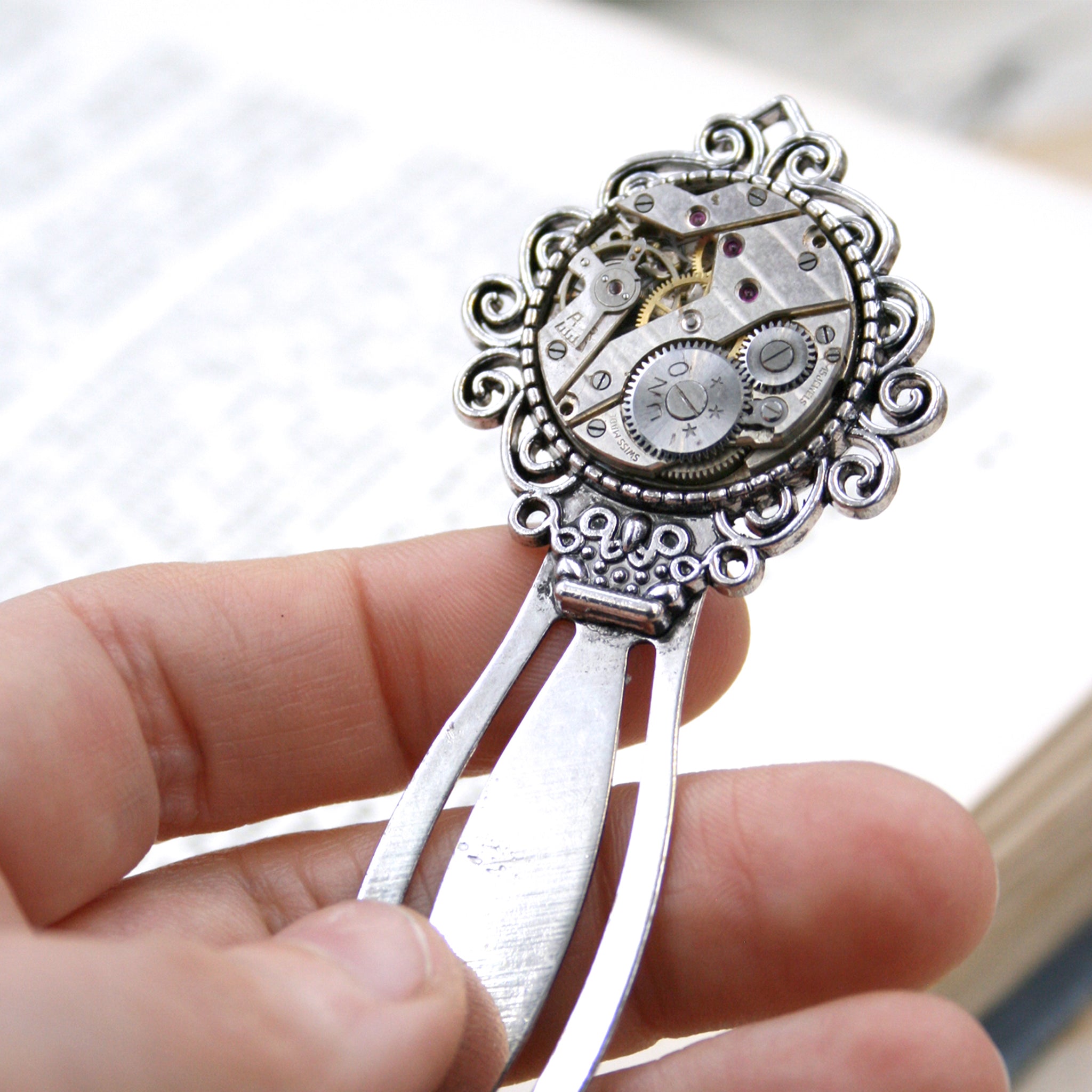 steampunk bookmark made of metal and antique watch movement