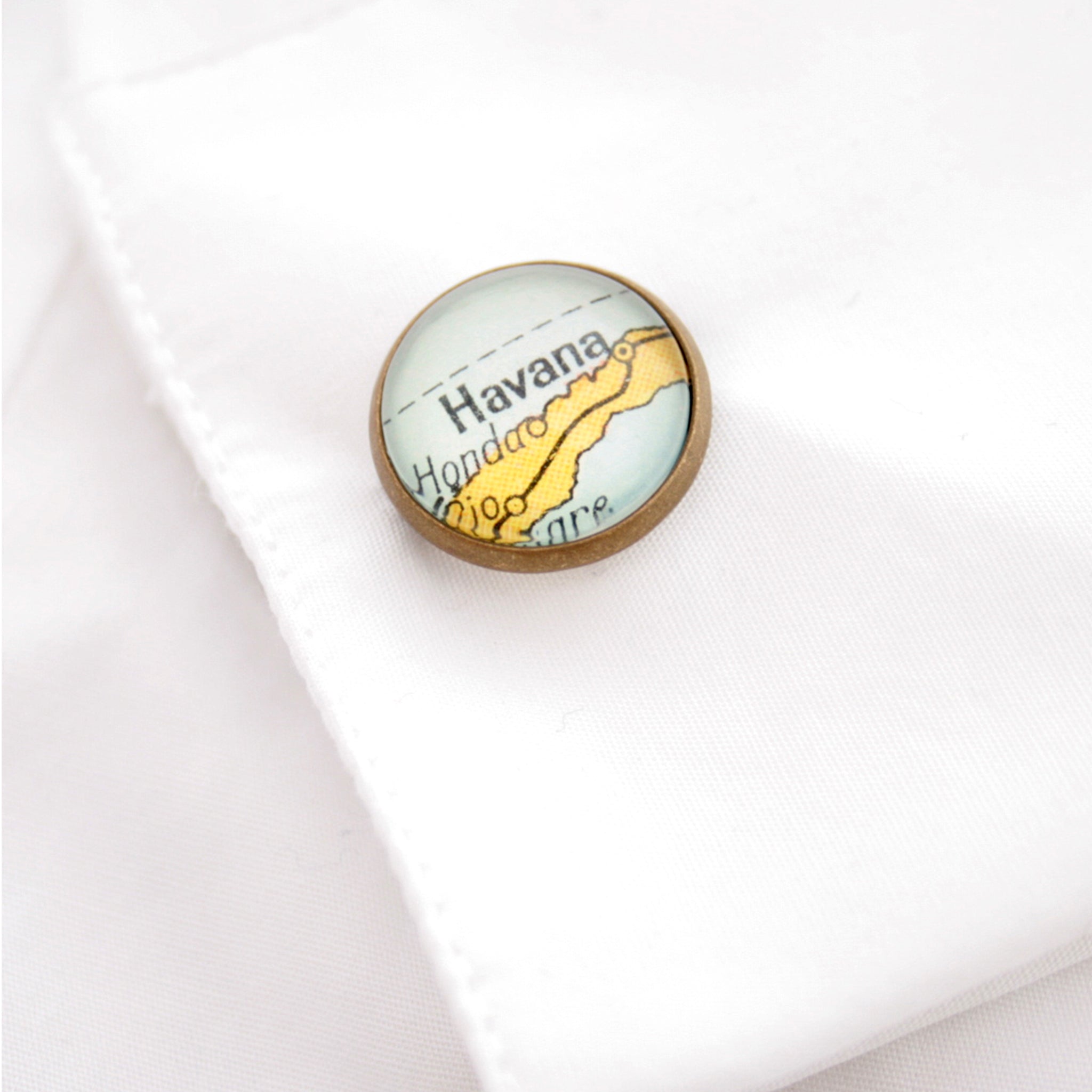 Personalised map cufflinks in bronze color in shirts cuff