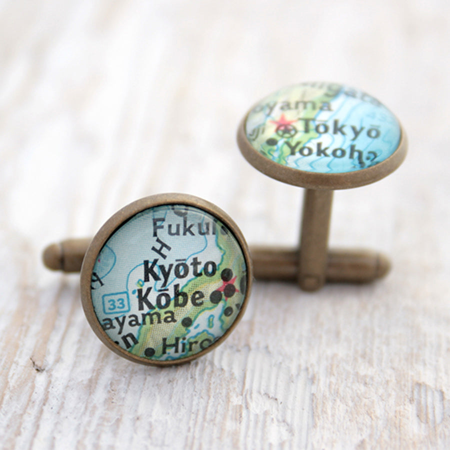 Personalised map cufflinks in antique bronze color featuring maps of Detroit and Chicago