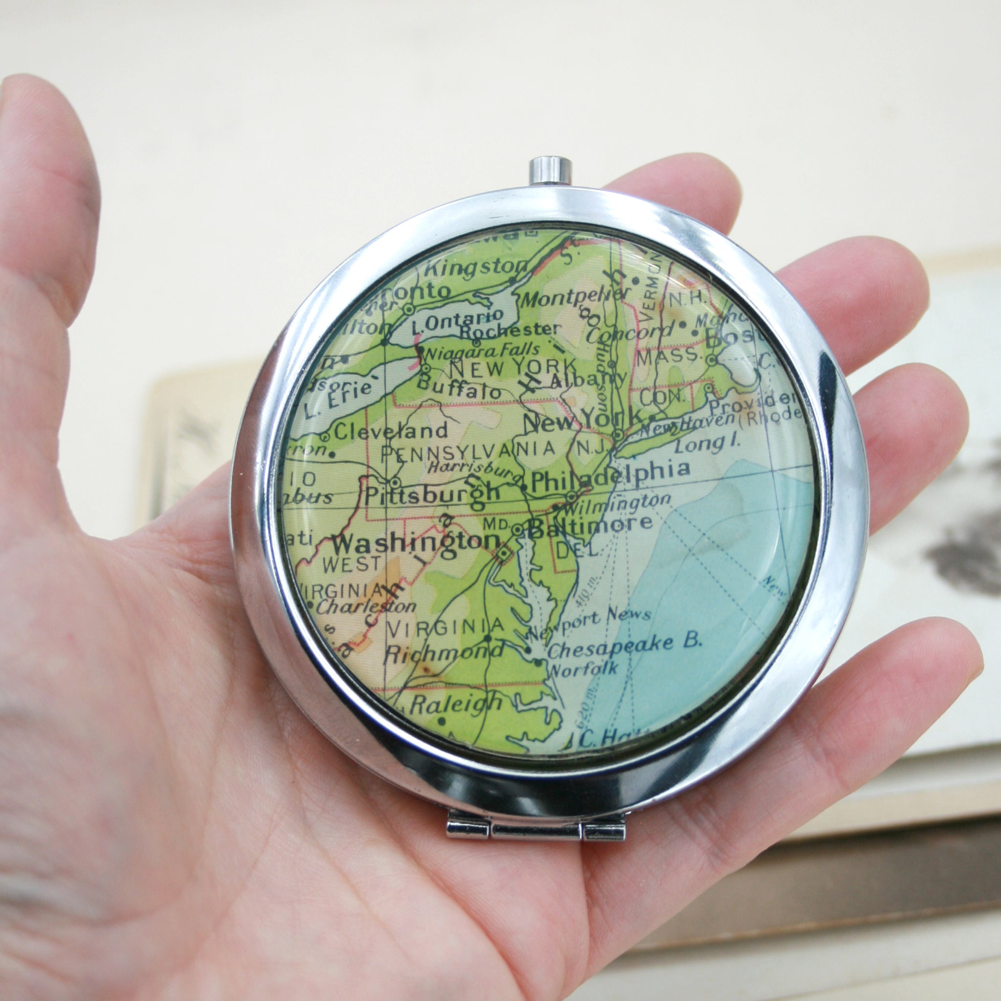 Hold in hand Personalised Compact Mirror in silver color featuring map of New York