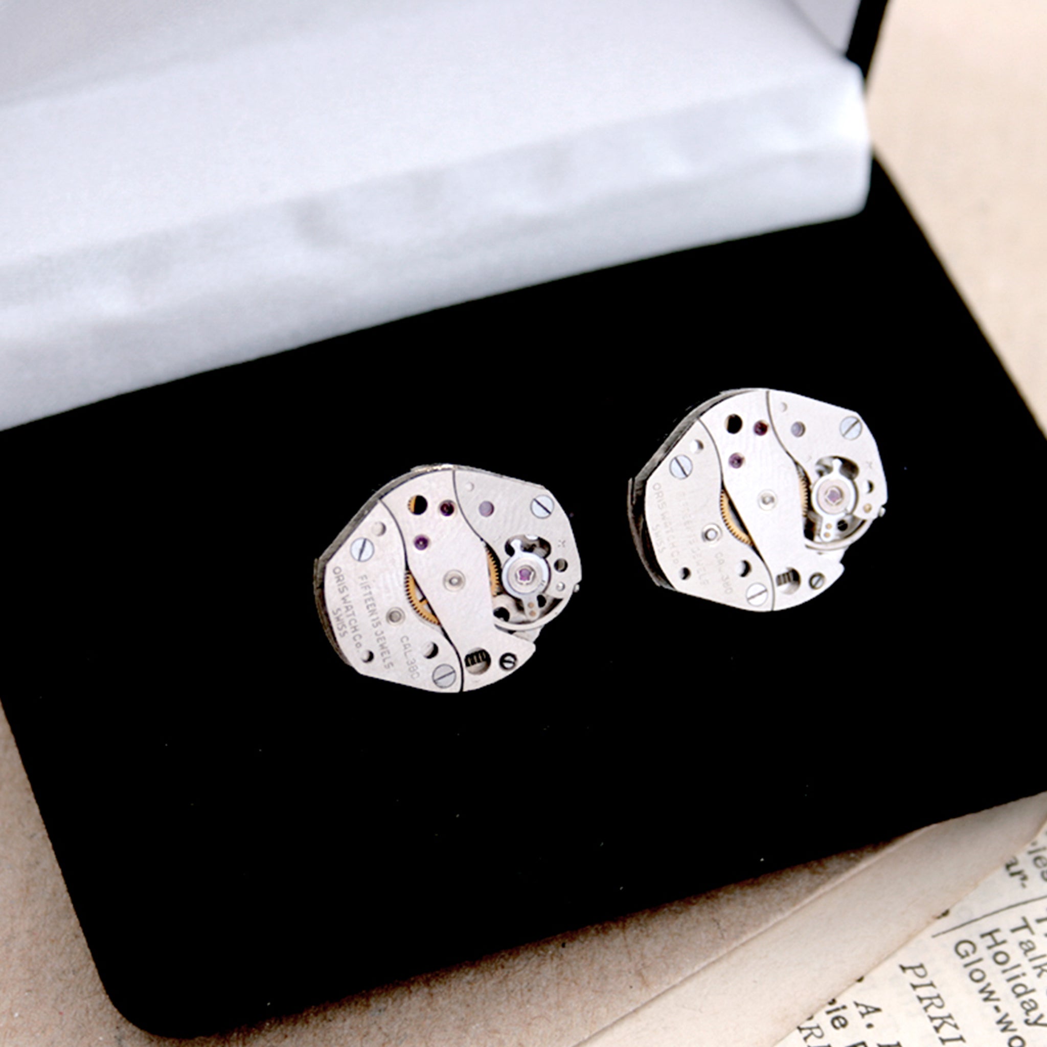 cool watch cufflinks for men featuring antique movements in black velour box