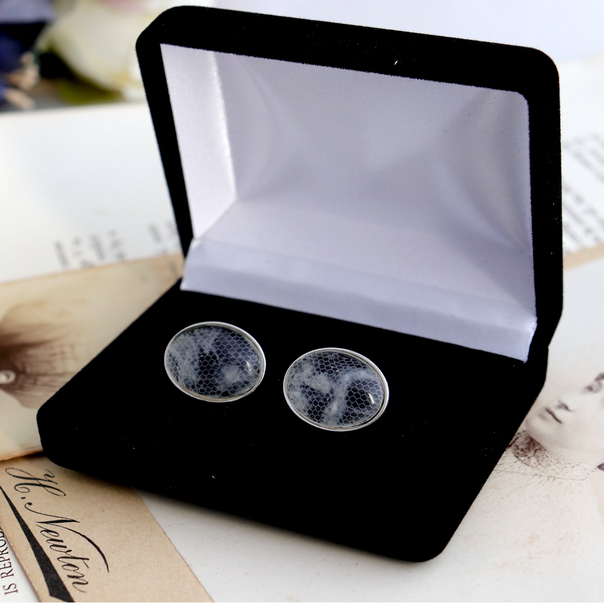 Sterling silver cufflinks with resin beads featuring lace from a bride's wedding dress in a box