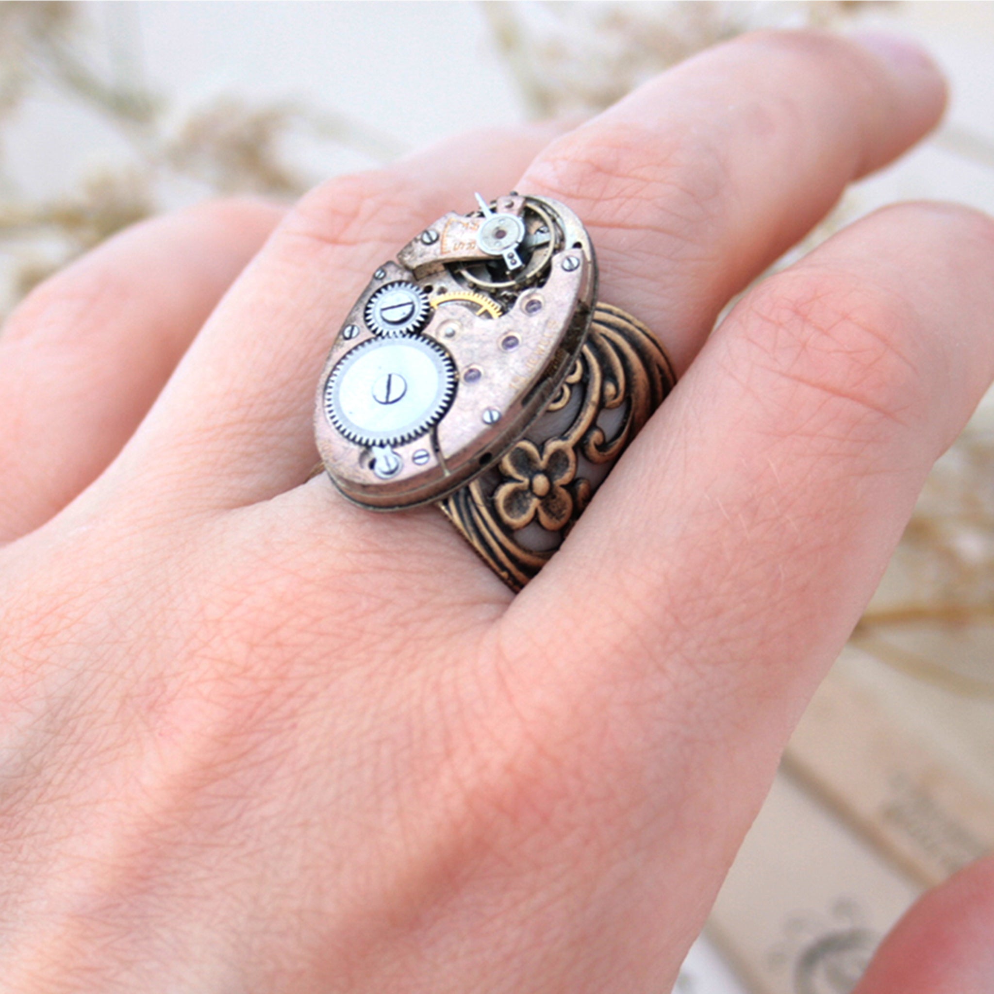 Gothic Ring with Bronze Floral Maxi Band on hand