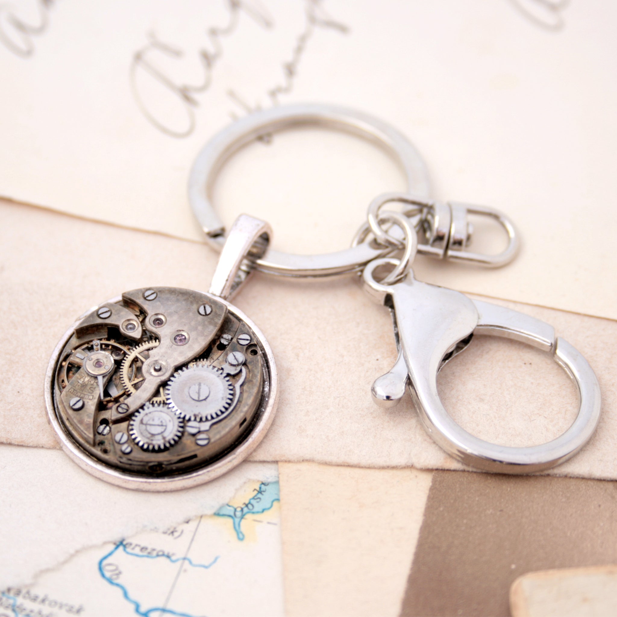 Cool keychain for him in steampunk style with watch movement