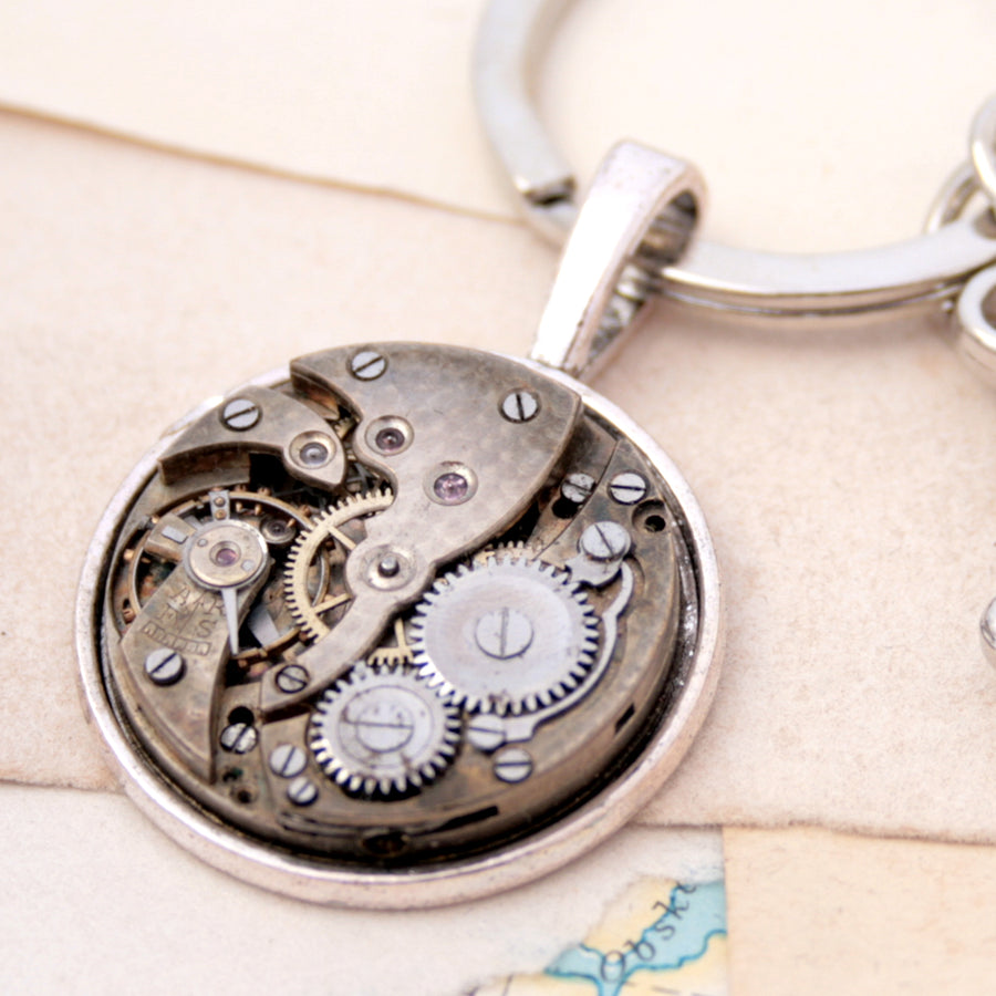 Cool keychain for him in steampunk style with watch movement