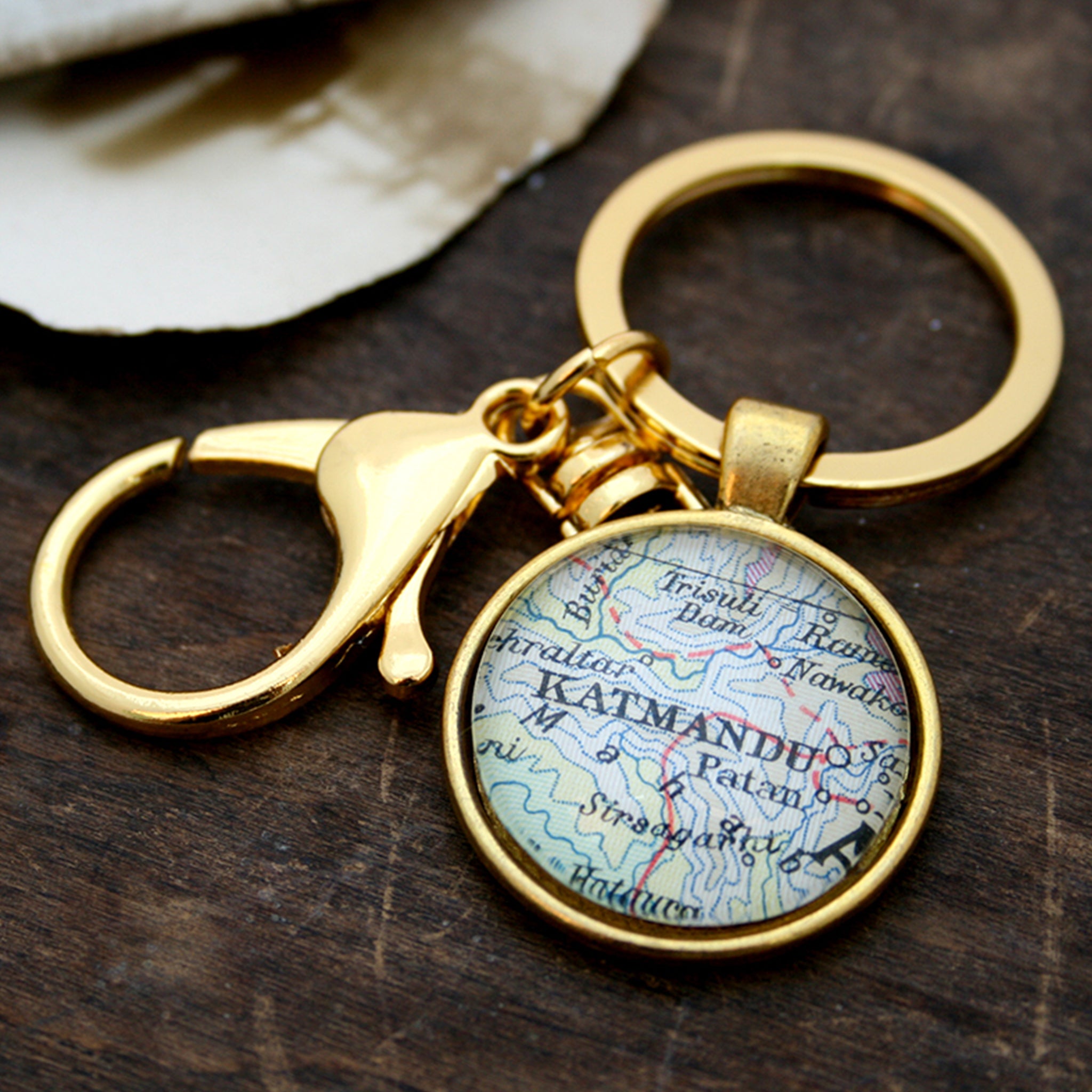 Personalised keyring in gold color featuring map of Kathmandu