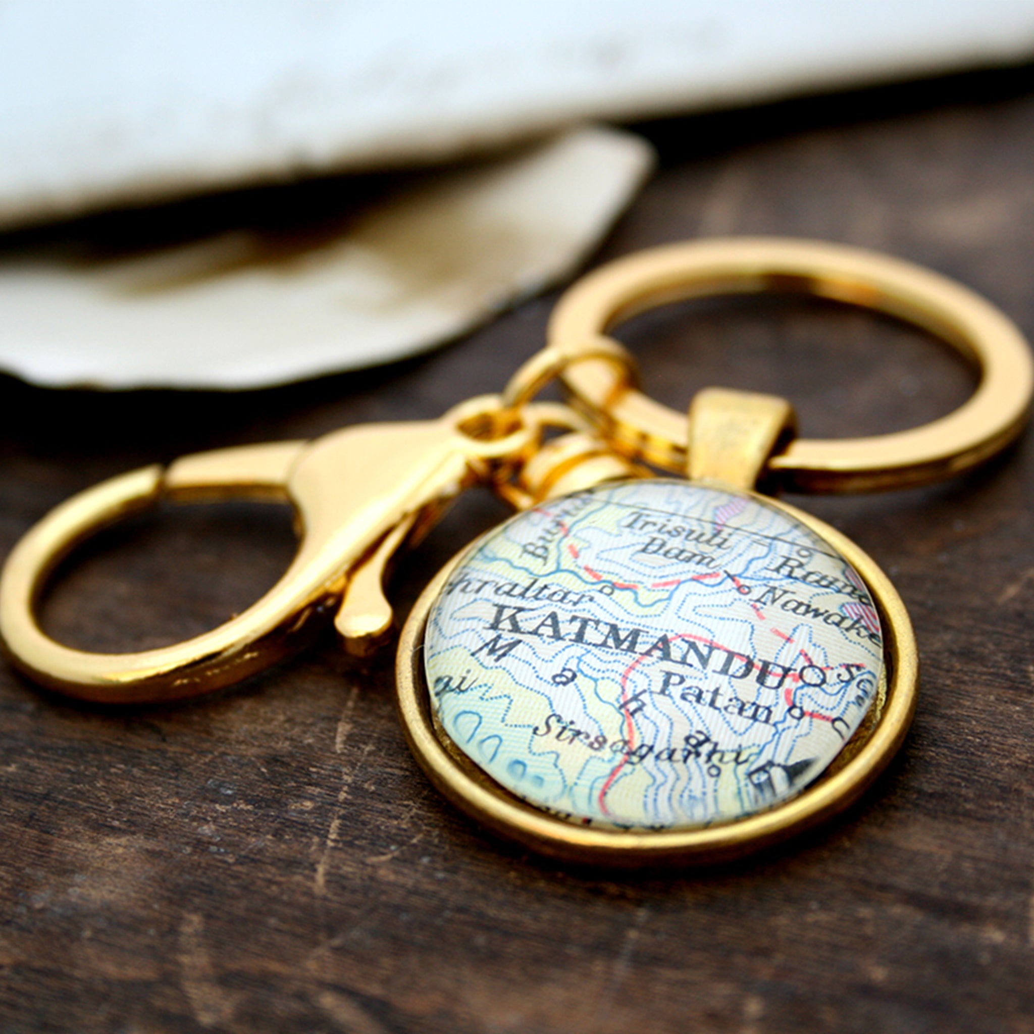 Personalised keyring in gold color featuring map of Kathmandu