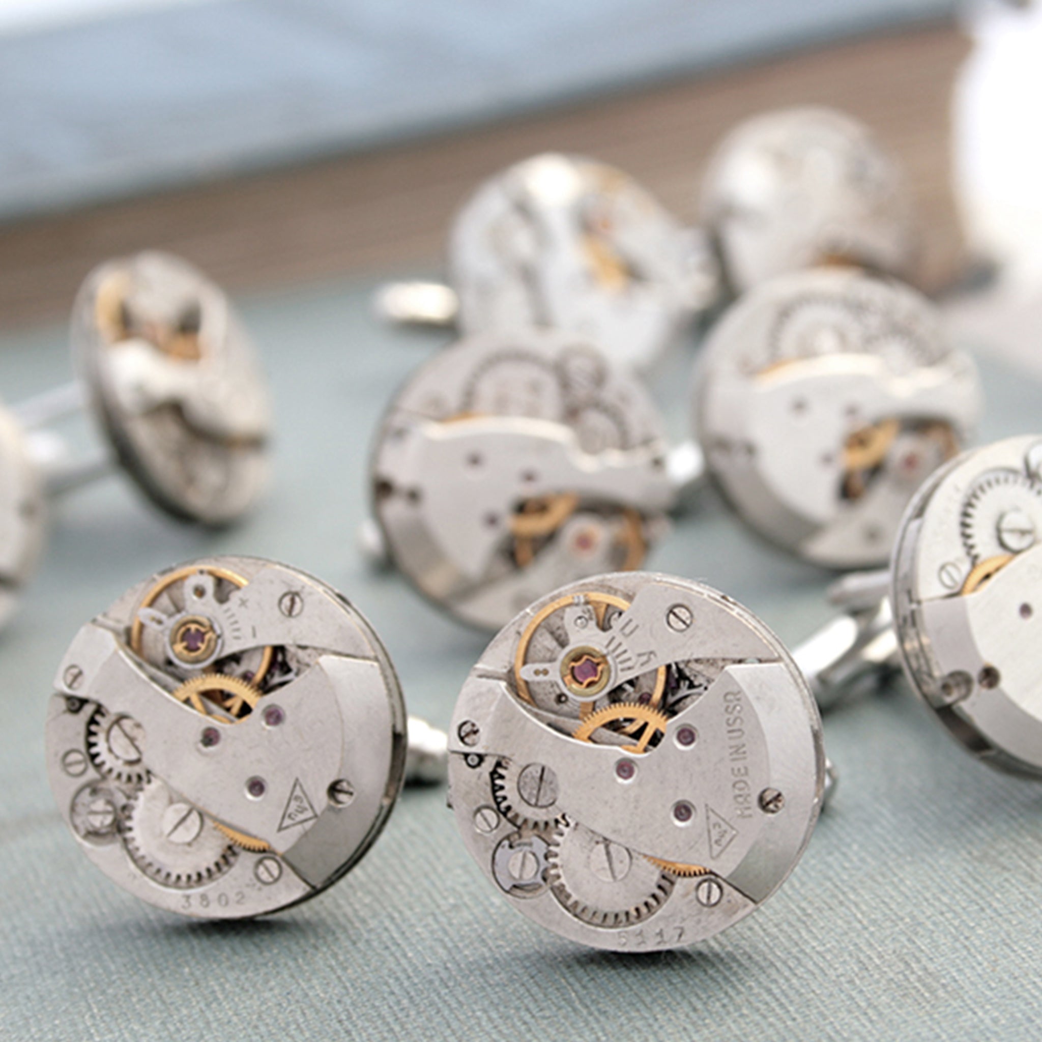 Many sets of Novelty Watch Cufflinks made of real watches