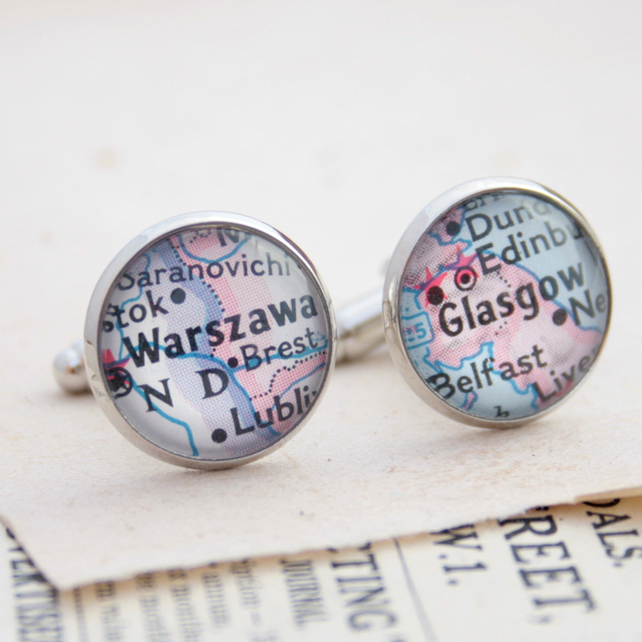 Personalised map cufflinks in silver tone featuring maps of Warszawa and Glasgow