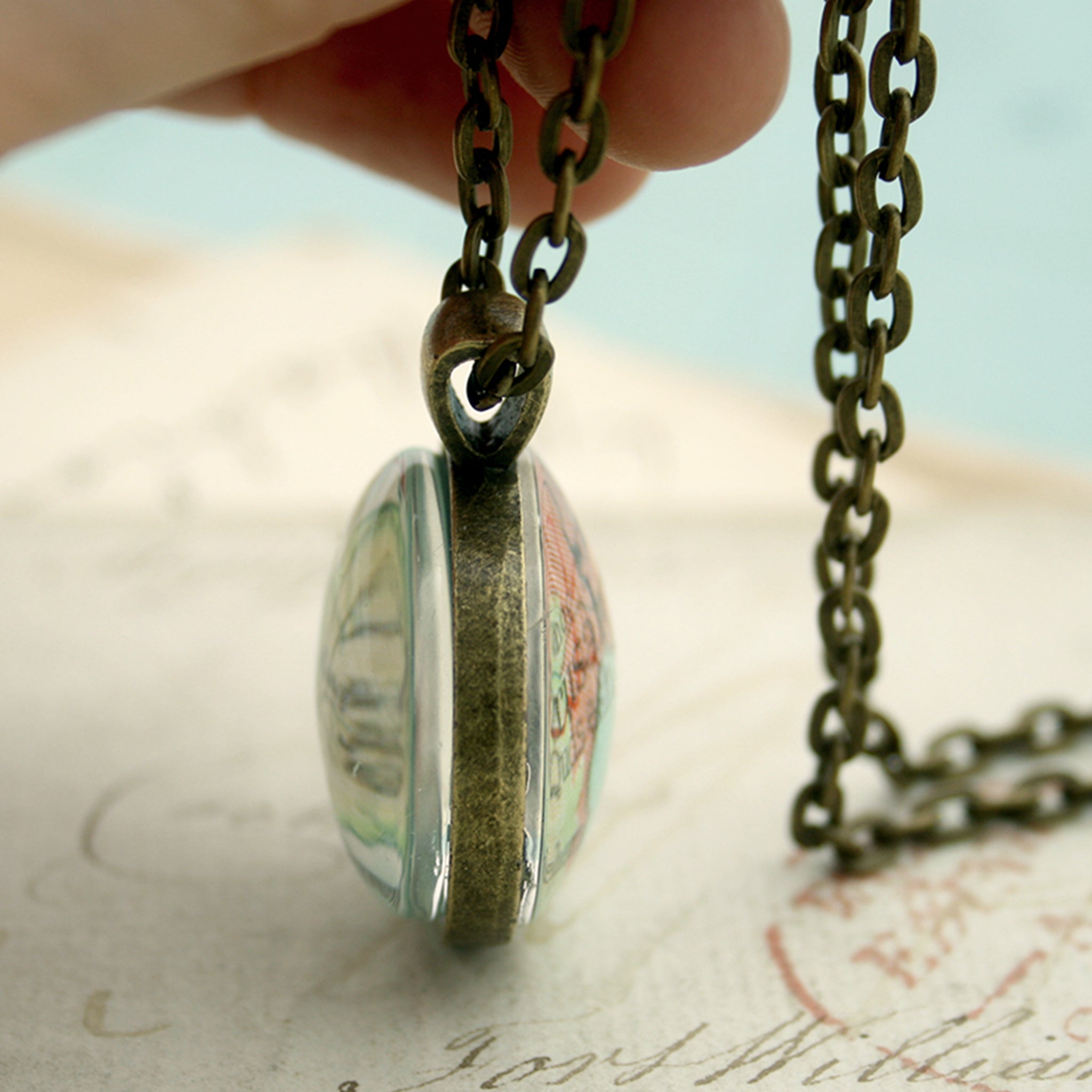 Bronze double sided pendant necklace featuring map of Jerusalem